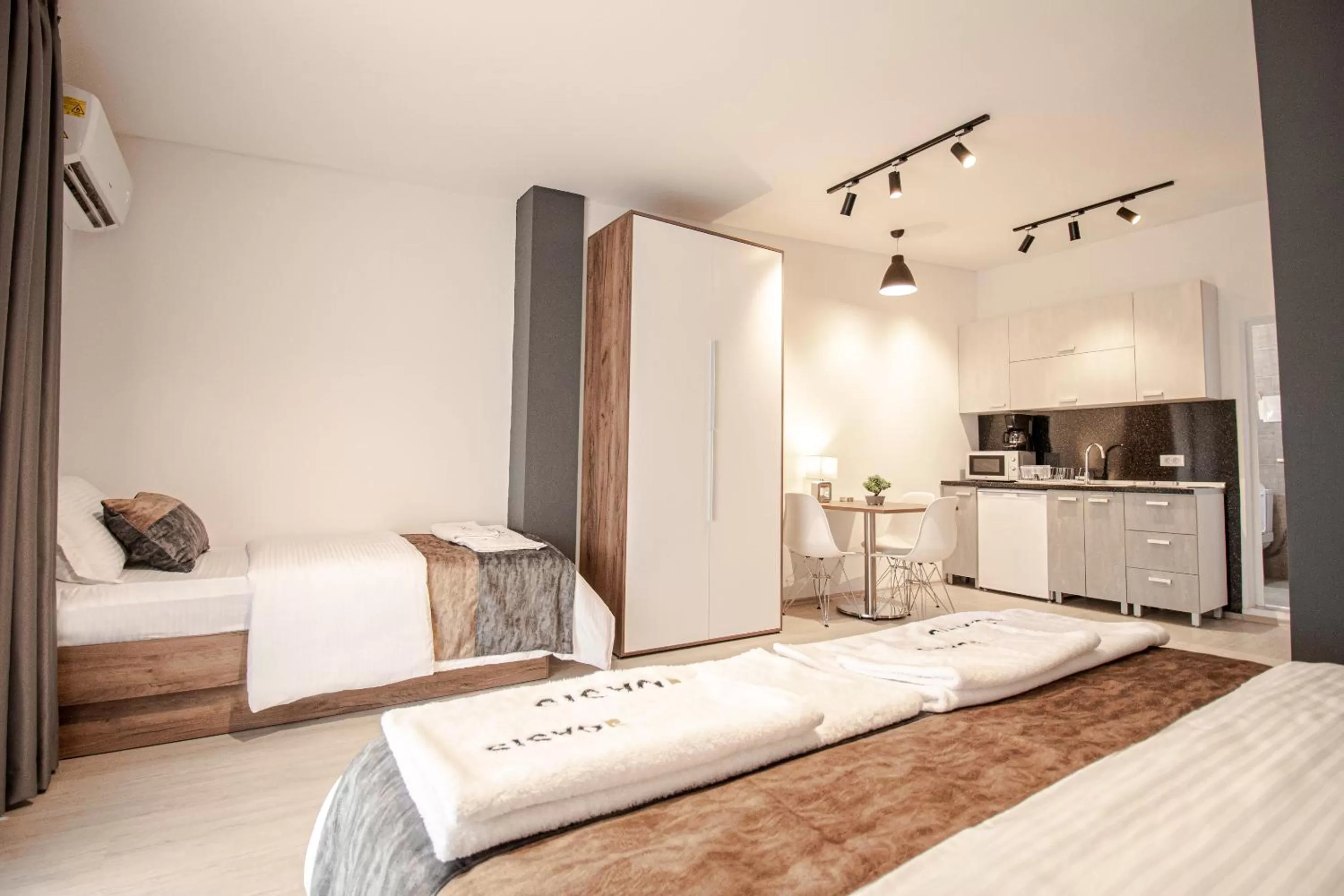 Bed in OASIS Apartments