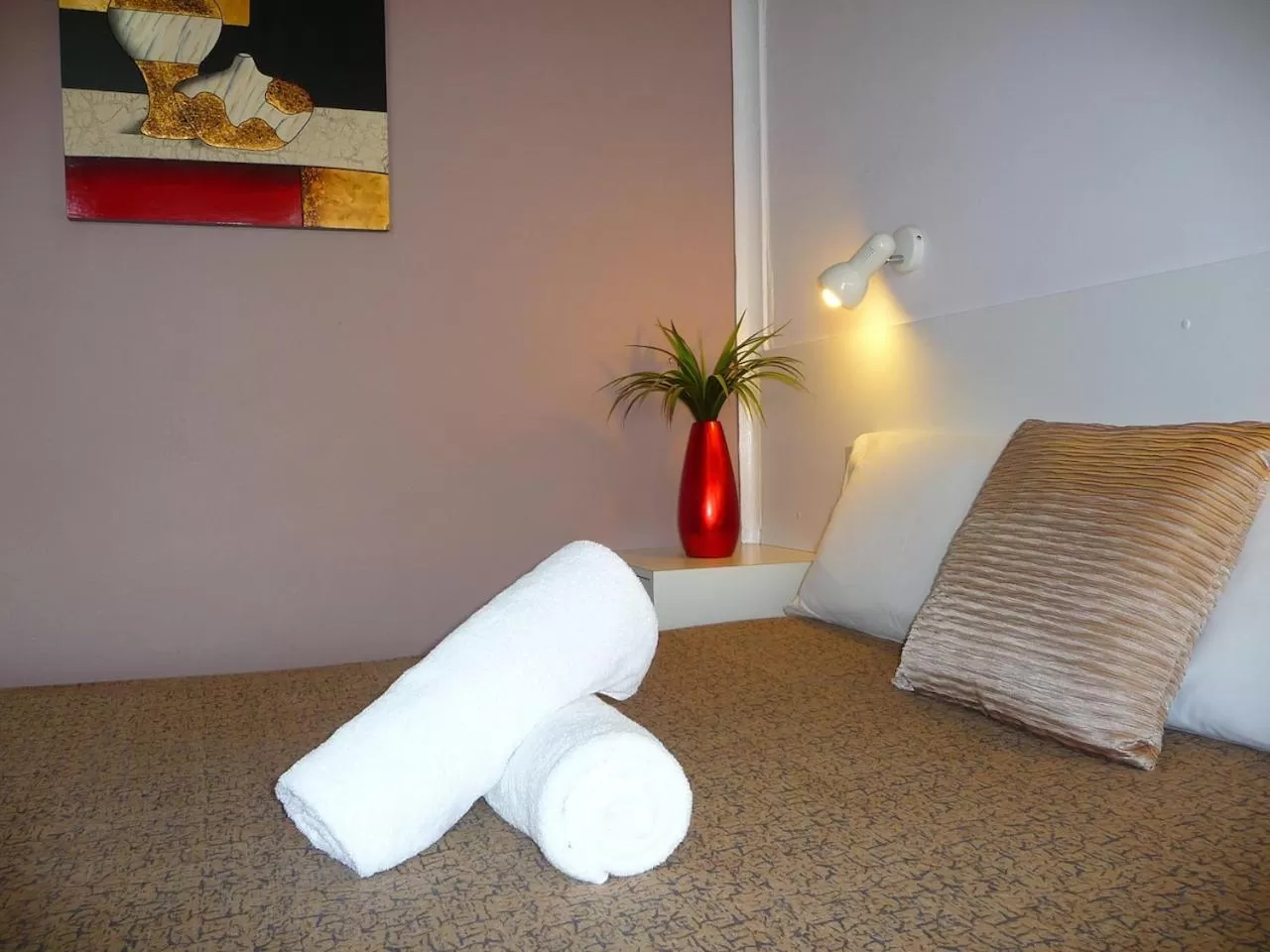 Bed in Blue Pelican Motel