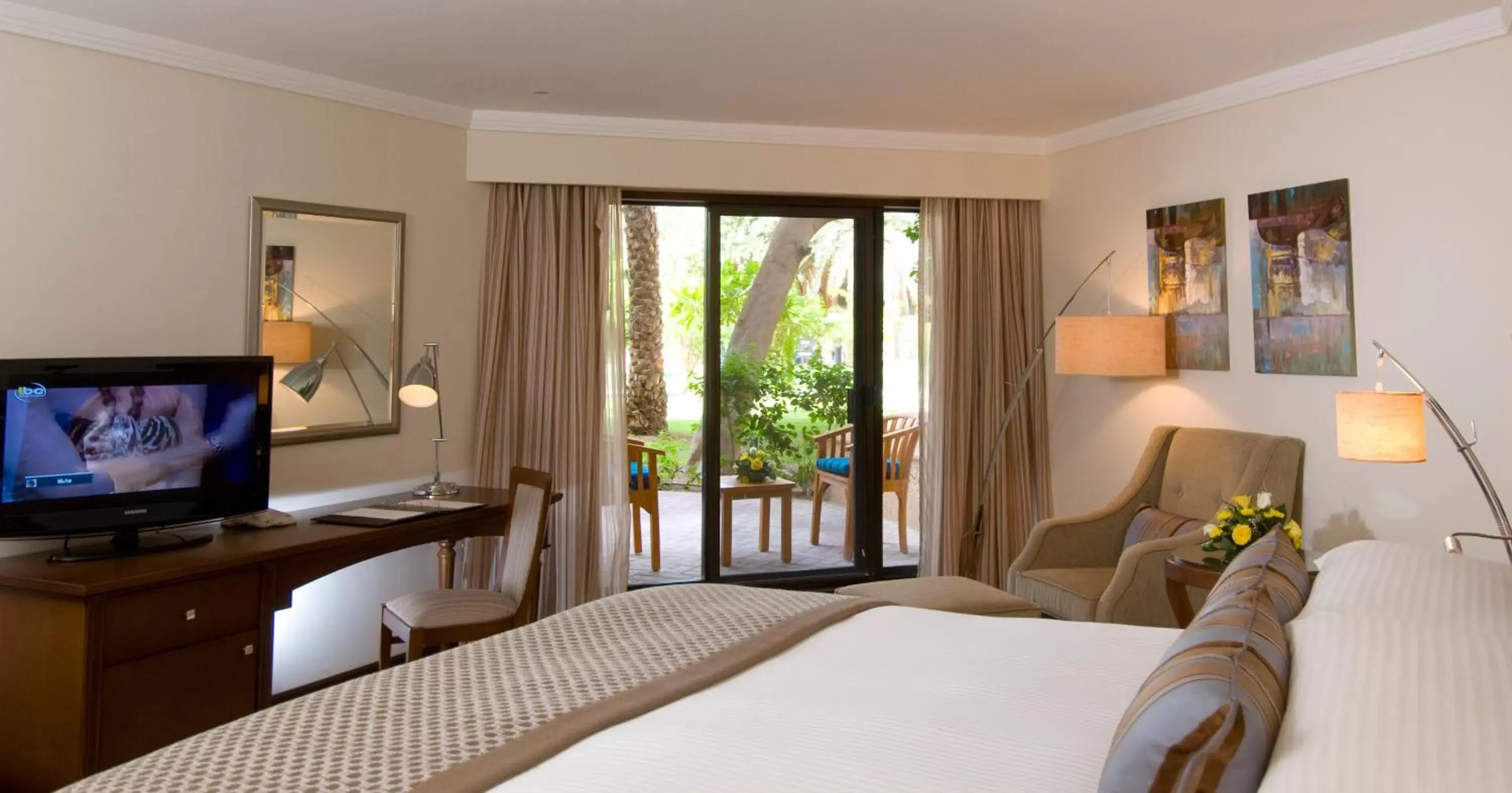 Bed, TV/Entertainment Center in Danat Al Ain Resort