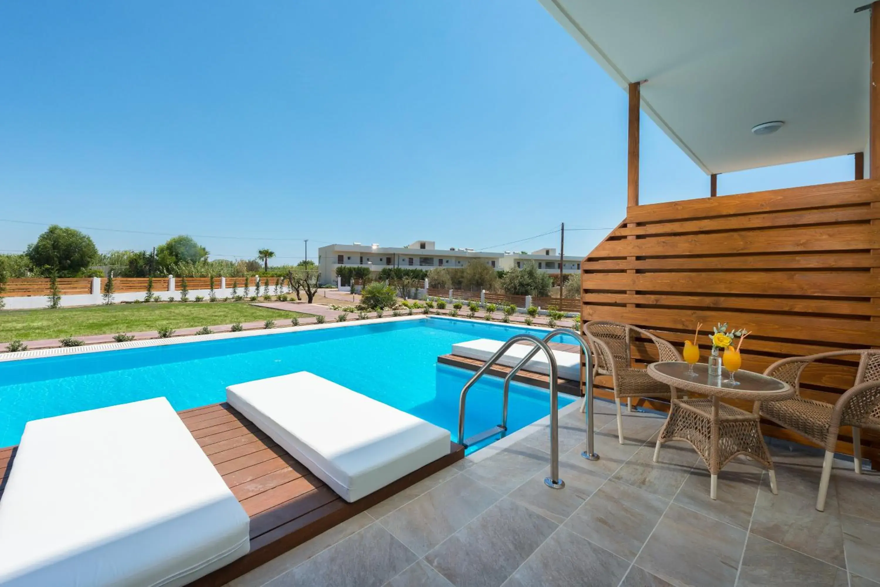 Balcony/Terrace, Swimming Pool in Afandou Bay Resort Suites