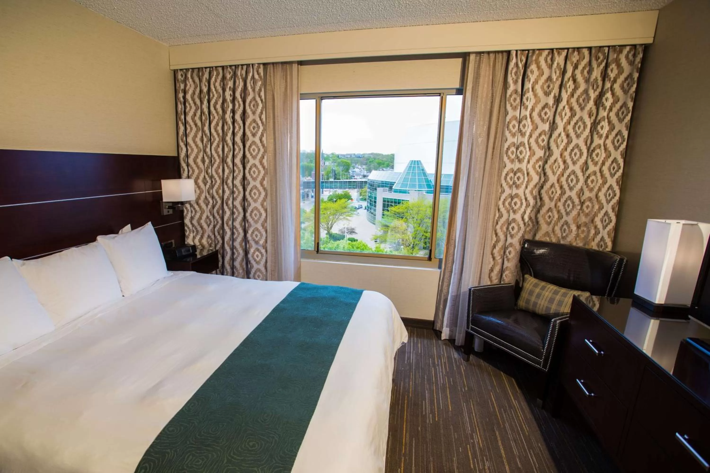 Photo of the whole room, Bed in Wyndham Moline on John Deere Commons