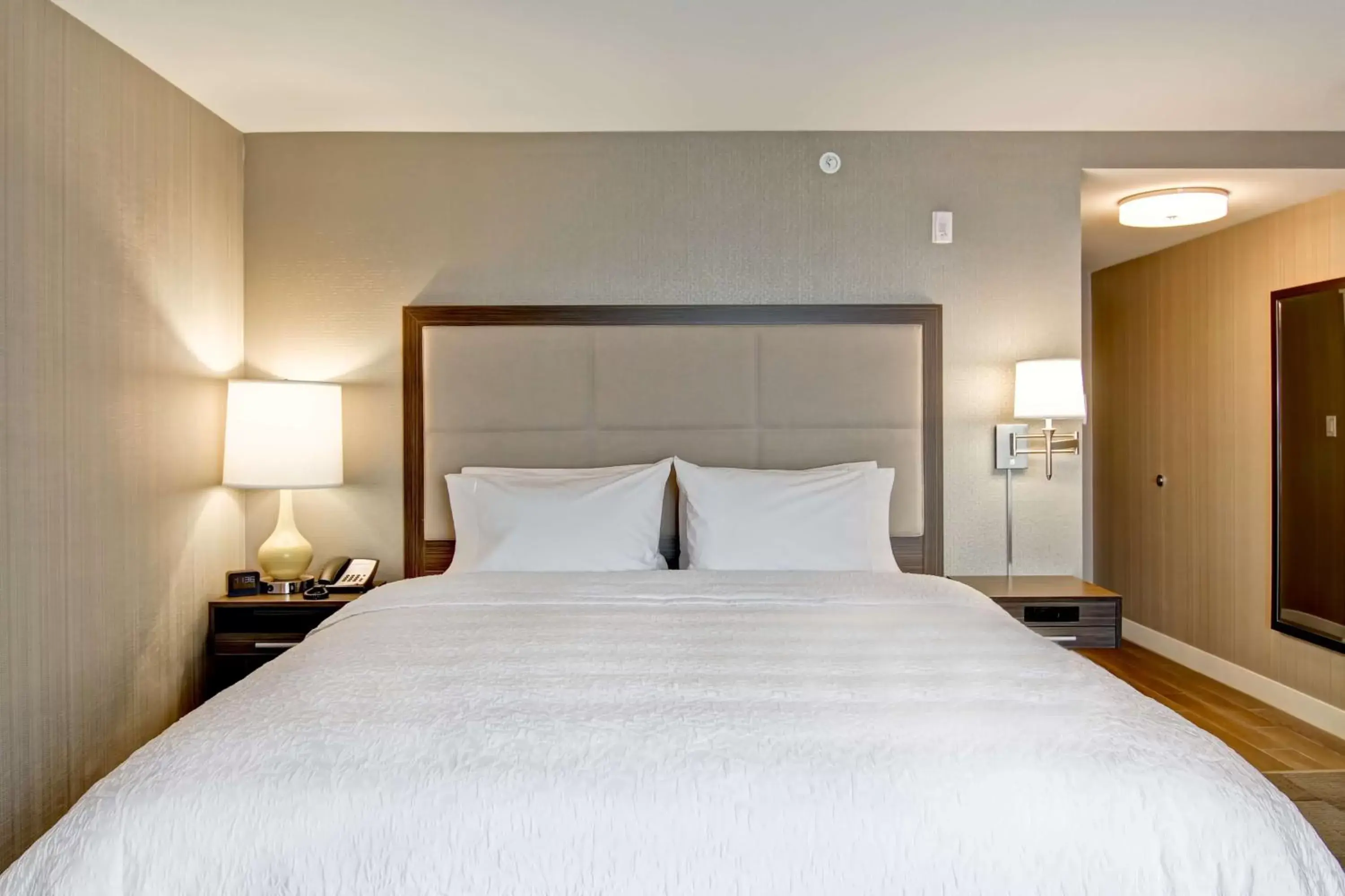 Bed in Hampton Inn & Suites by Hilton Saskatoon Airport