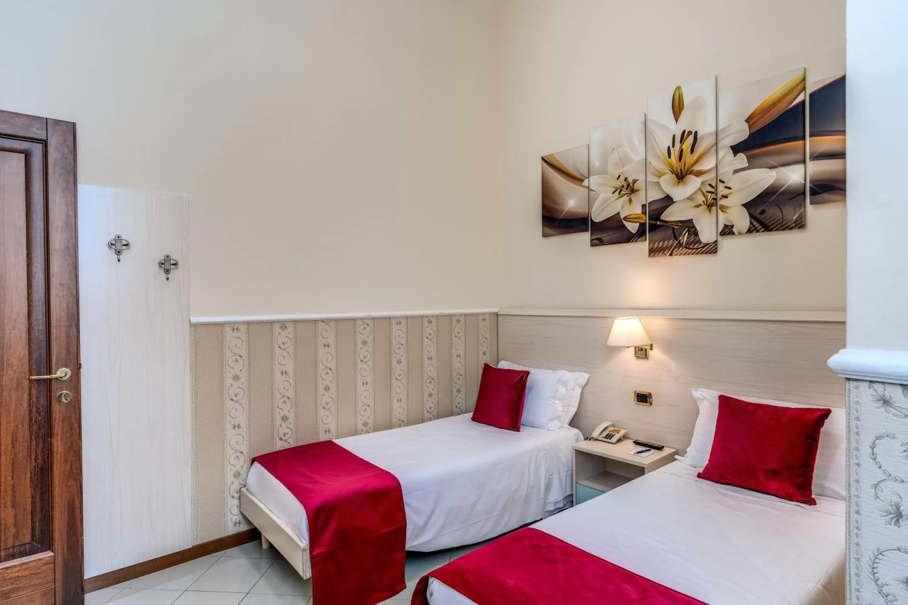 Bed in Hotel Ottaviano Augusto