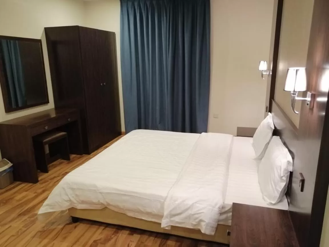 Bed in شقق درر رامه للشقق المخدومة 10