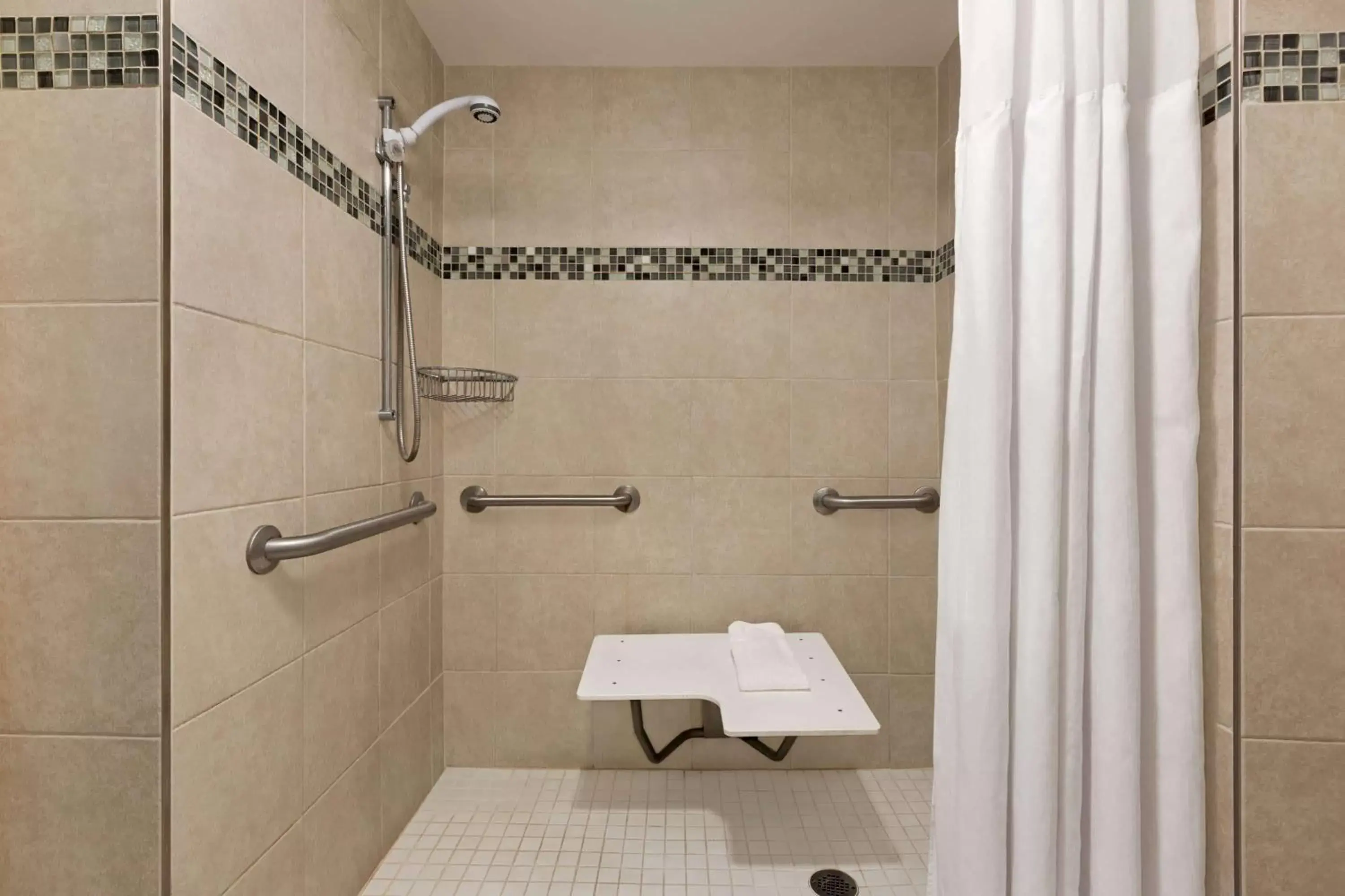 Shower, Bathroom in Ramada by Wyndham Suites Orlando Airport