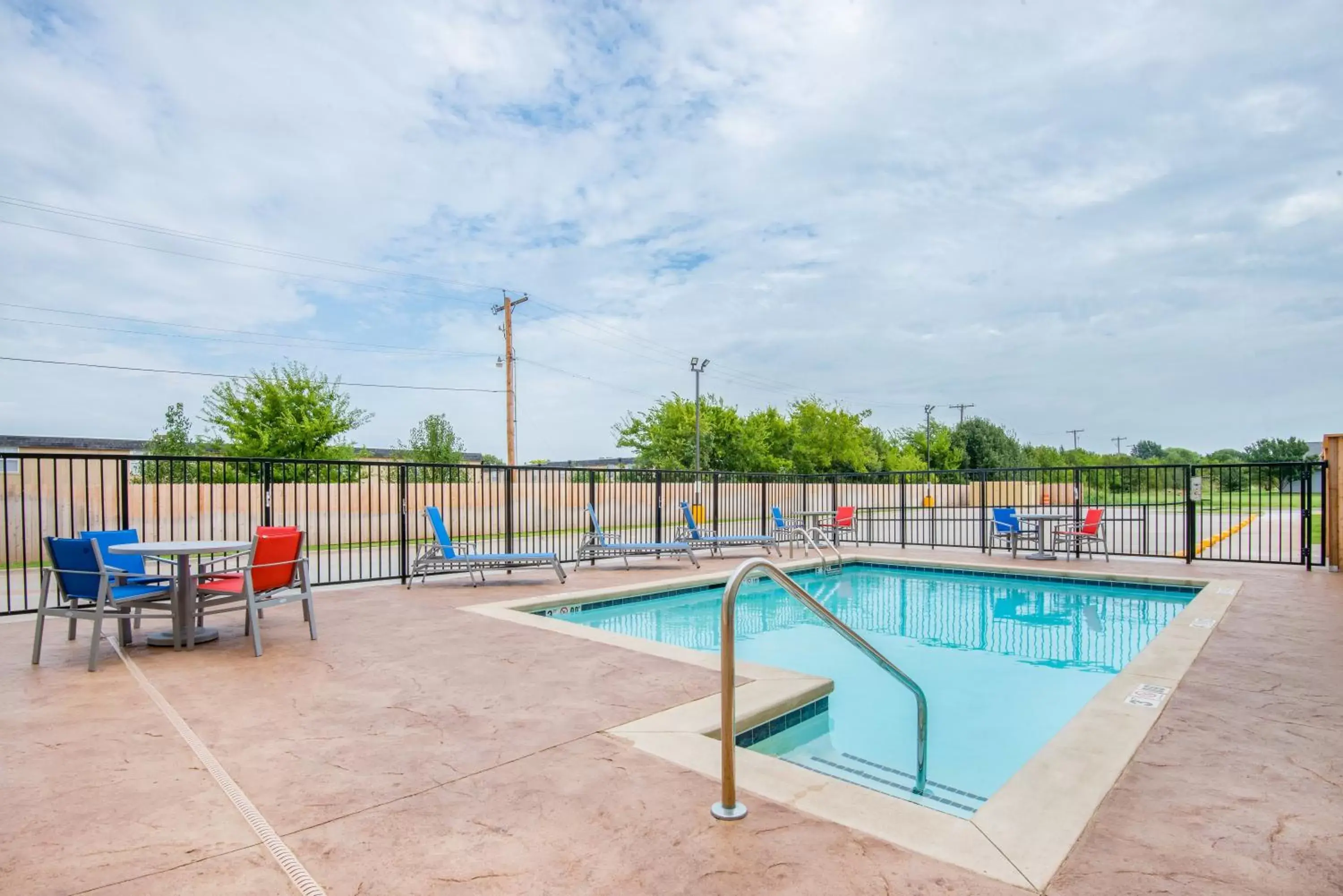 Swimming Pool in Holiday Inn Express & Suites Stillwater - University Area, an IHG Hotel