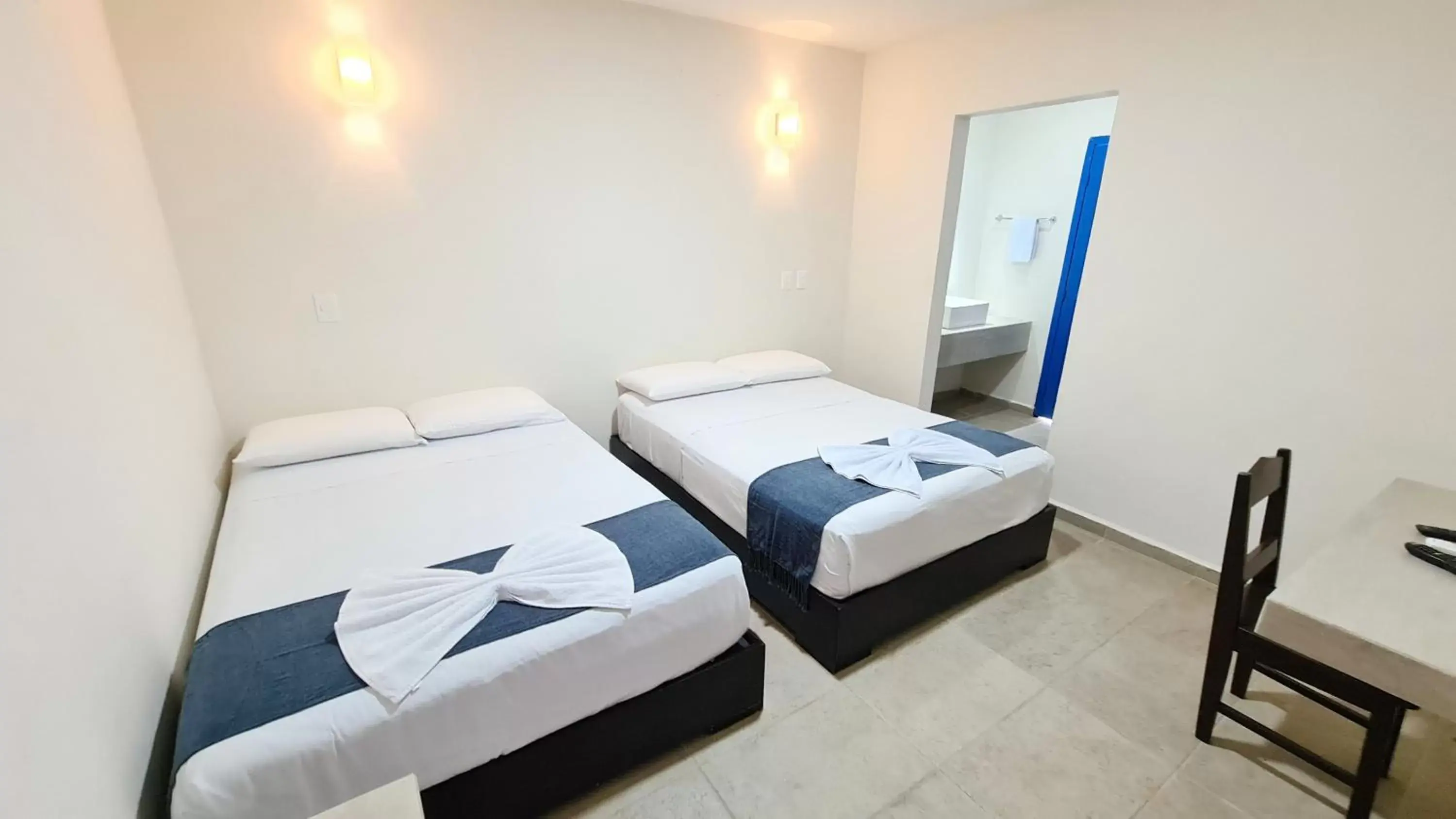 Quadruple Room with Garden View in Hotel Vista Laguna Bacalar Quadruple Room with Garden View in Hotel Vista Laguna Bacalar