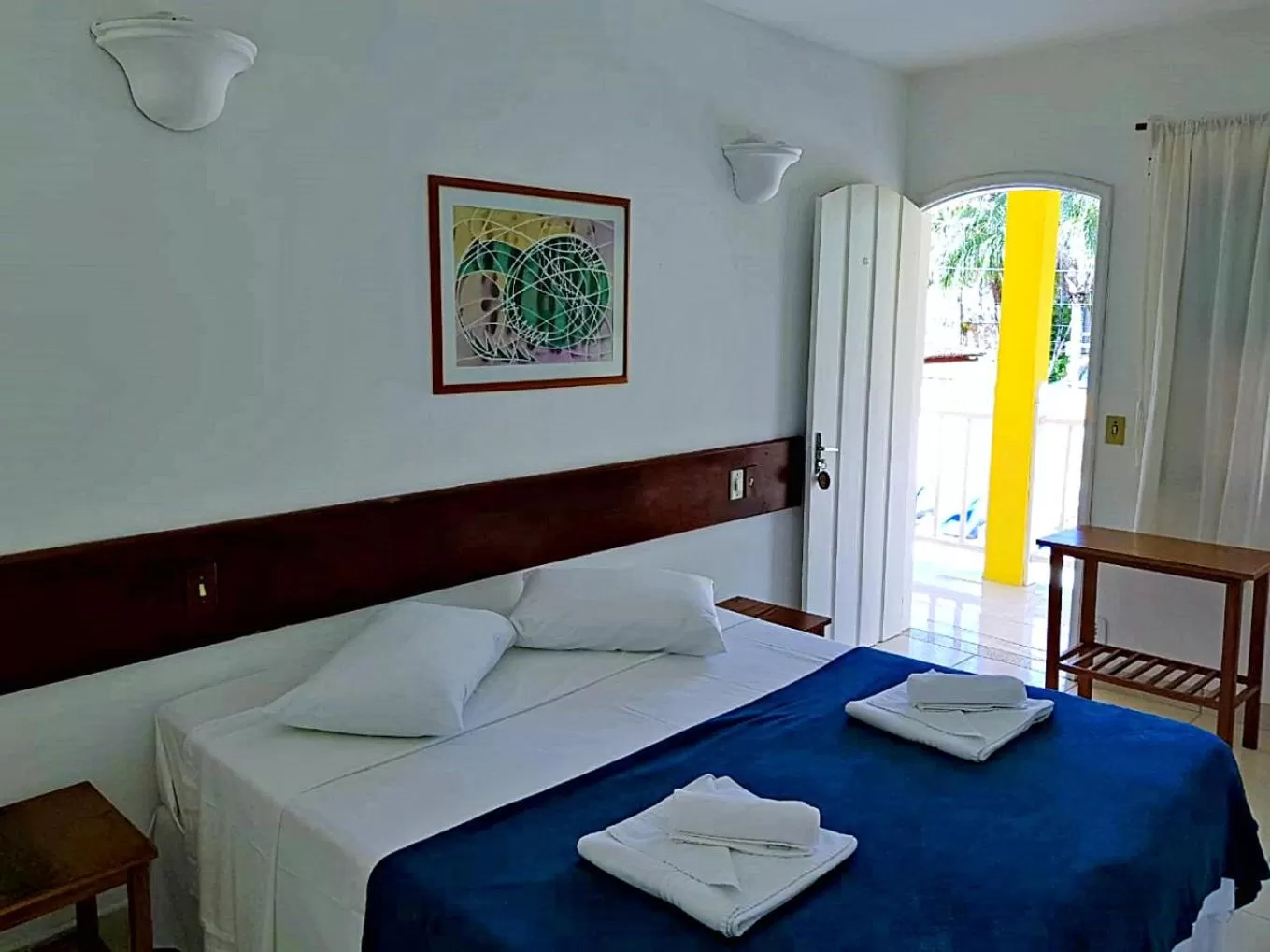 Bed in Pousada Estrela de Paraty