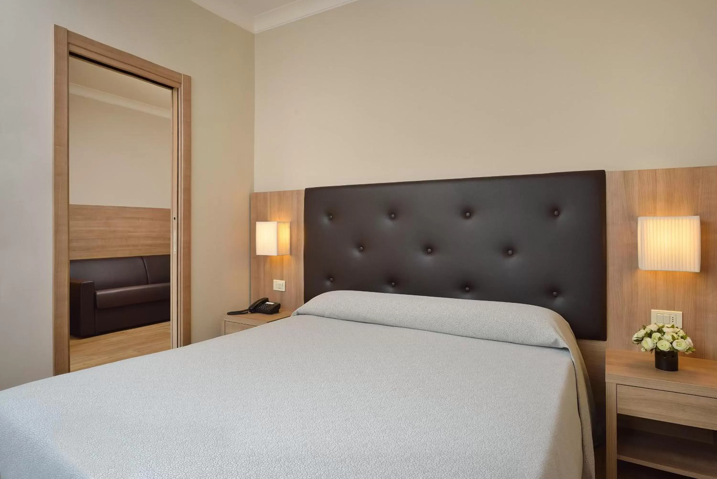 Bed in Hotel Rossini