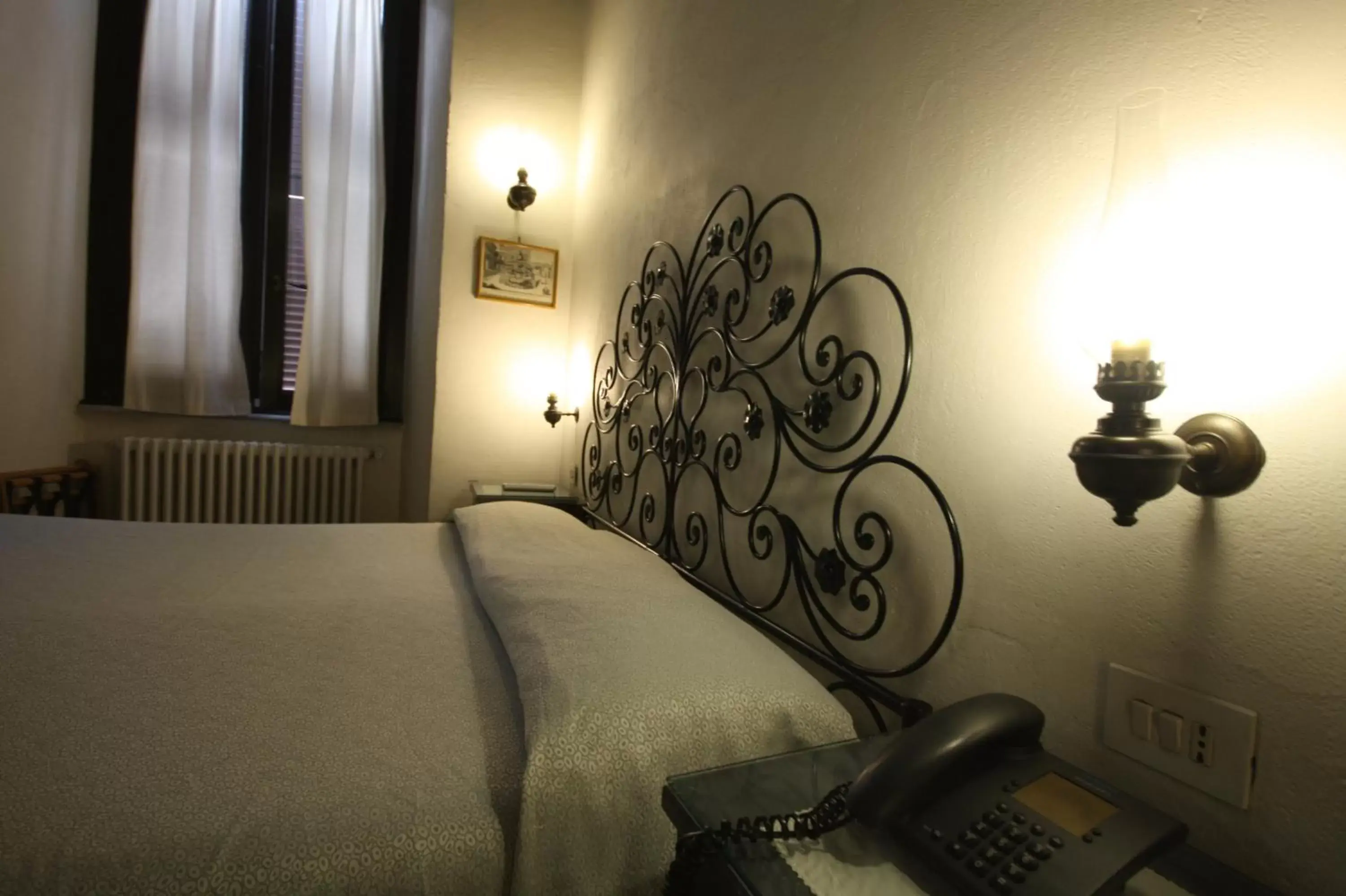 Decorative detail, Bed in Hotel Cherubini