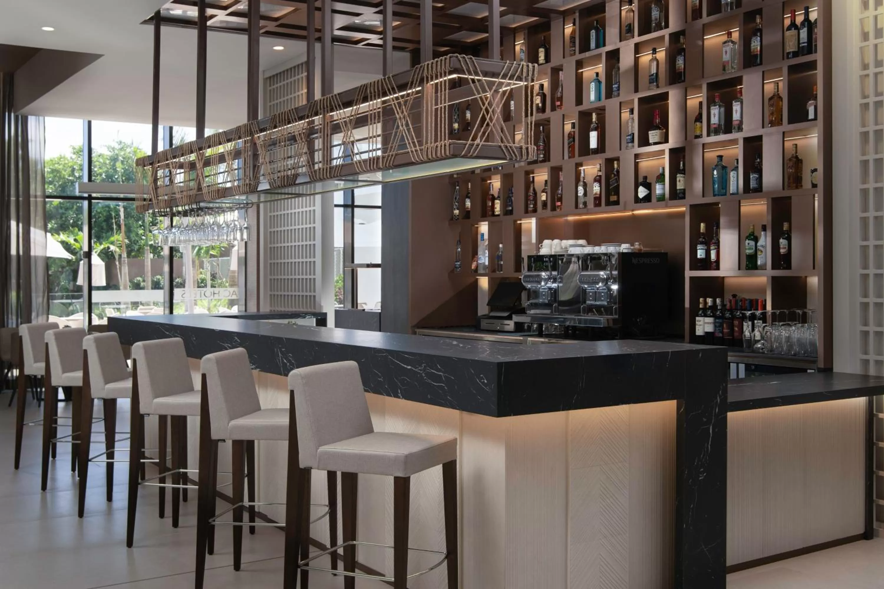 Lounge or bar in AC Hotel by Marriott Punta Cana