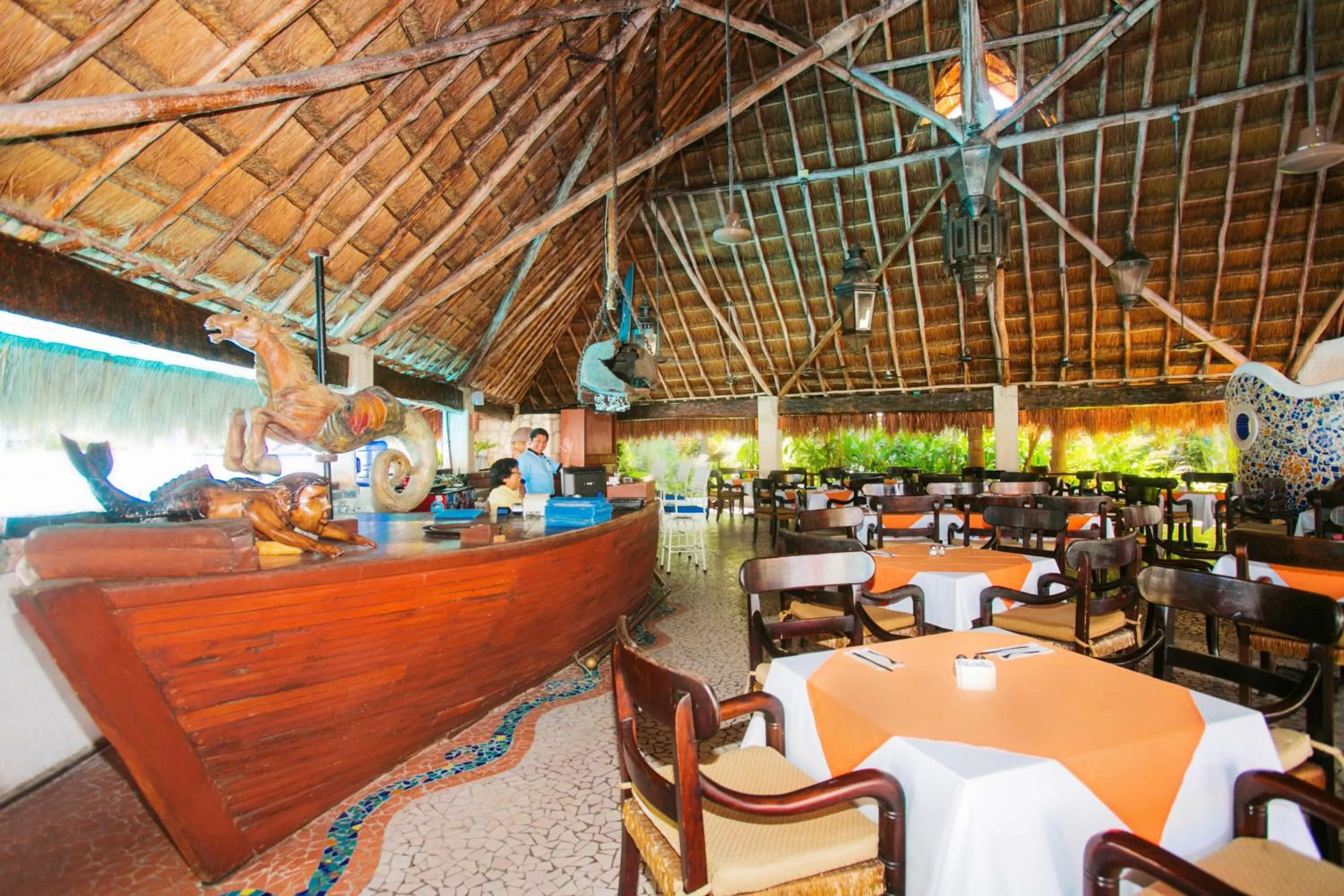 Restaurant/places to eat in Casa del Mar Cozumel Hotel & Dive Resort with free access to an exclusive beach club