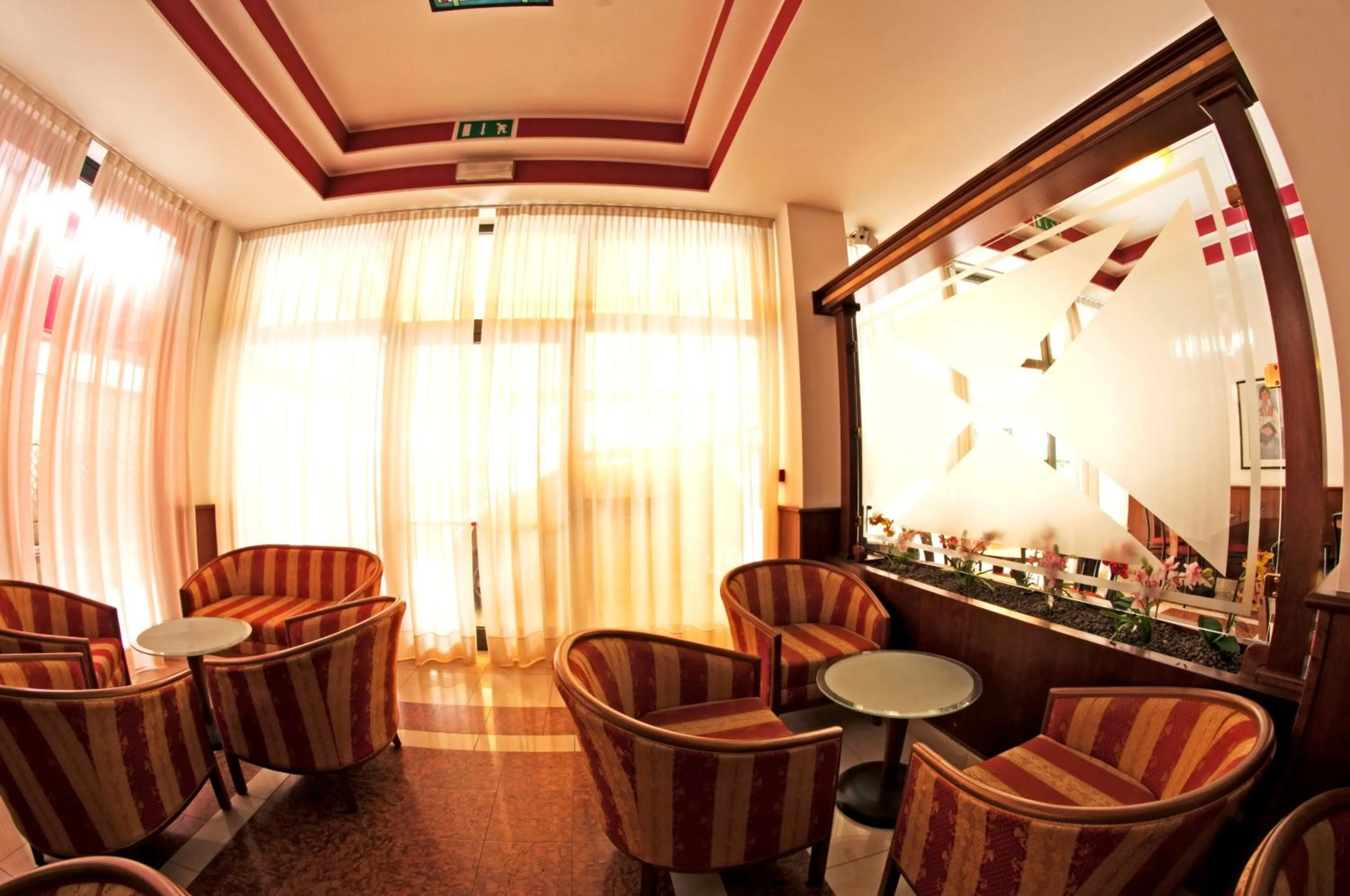 Communal lounge/ TV room in Hotel Primo