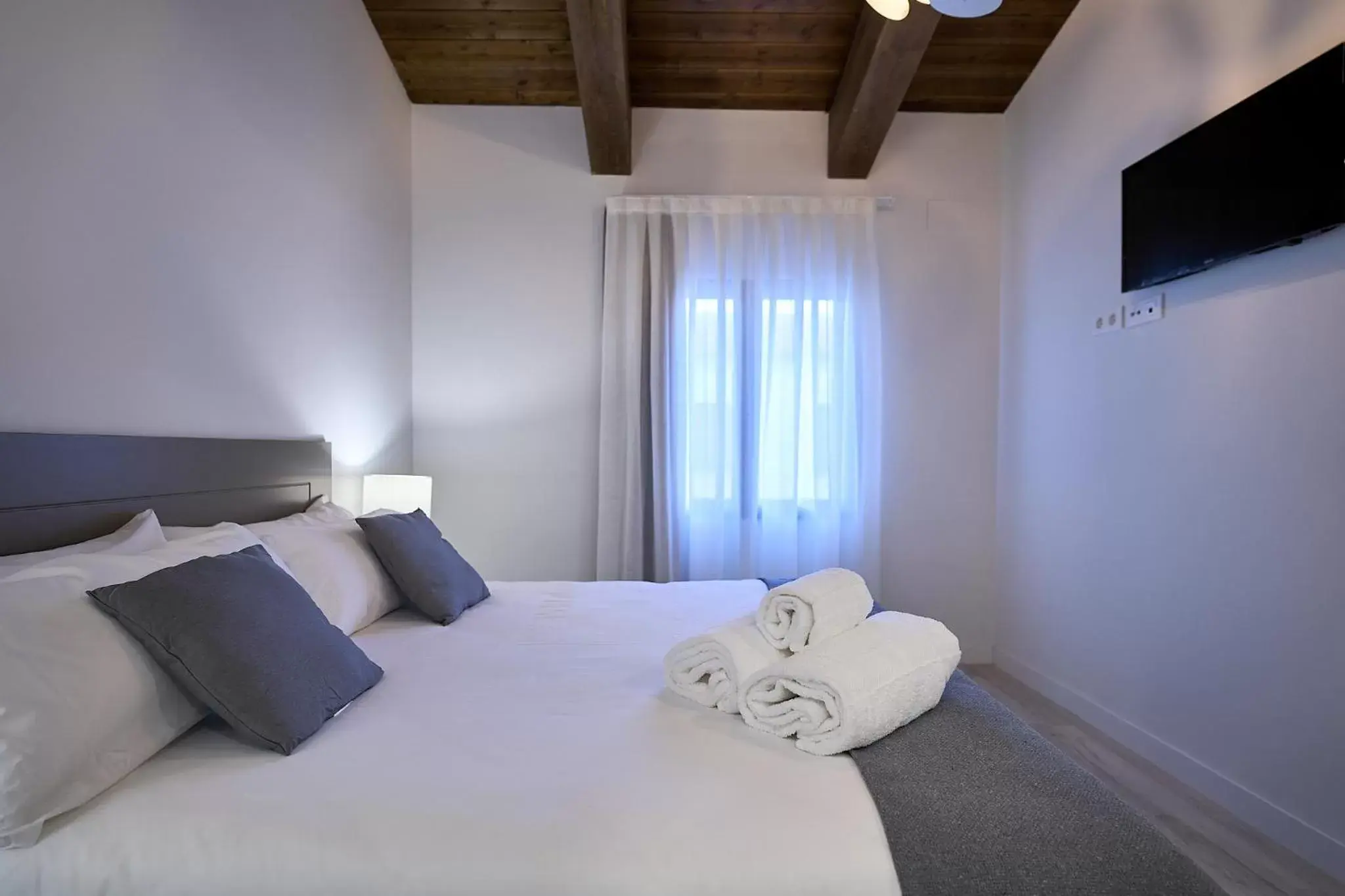 Bed in Inés Luna Suites