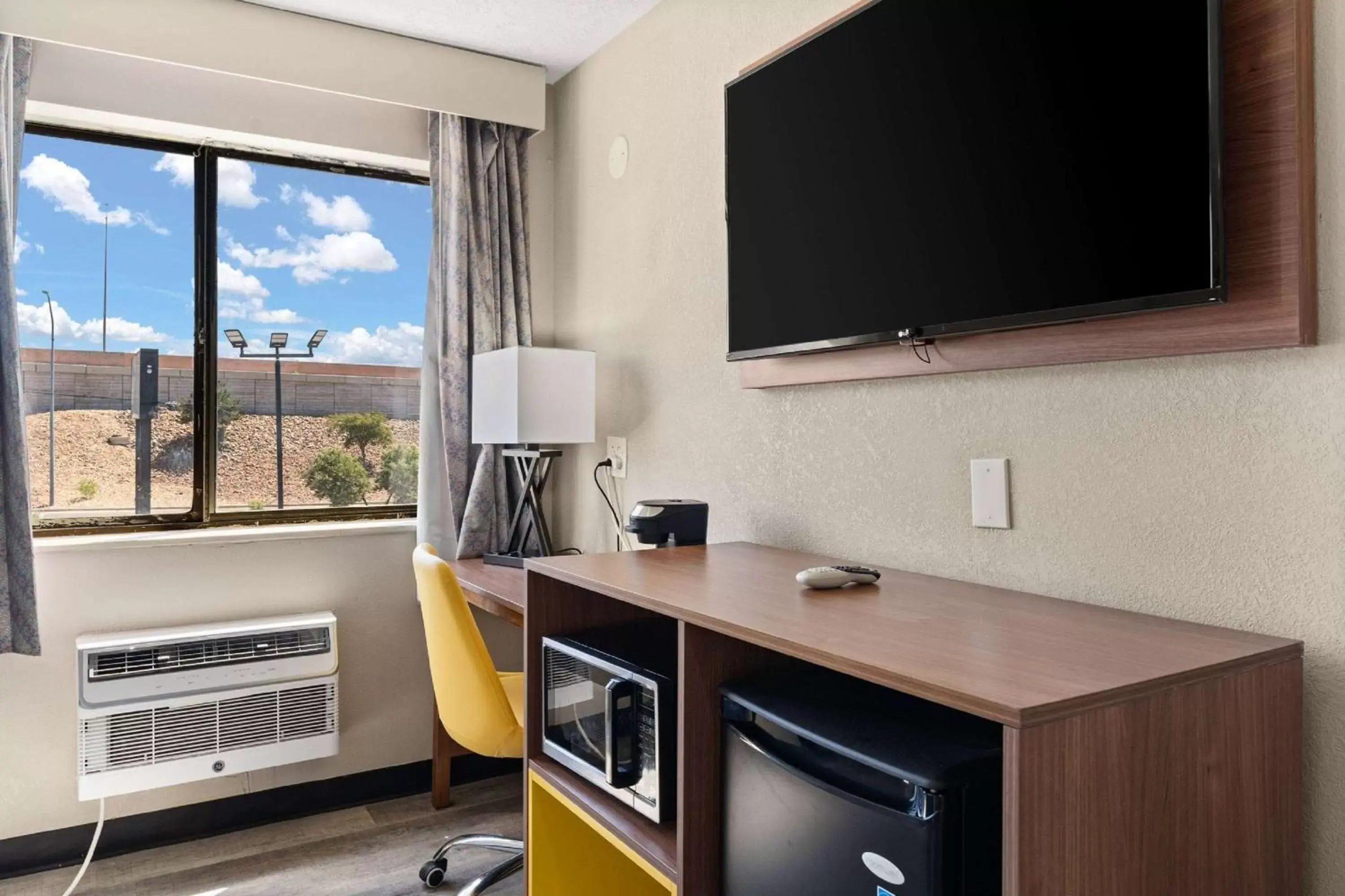 Photo of the whole room, TV/Entertainment Center in Days Inn by Wyndham Albuquerque I-25