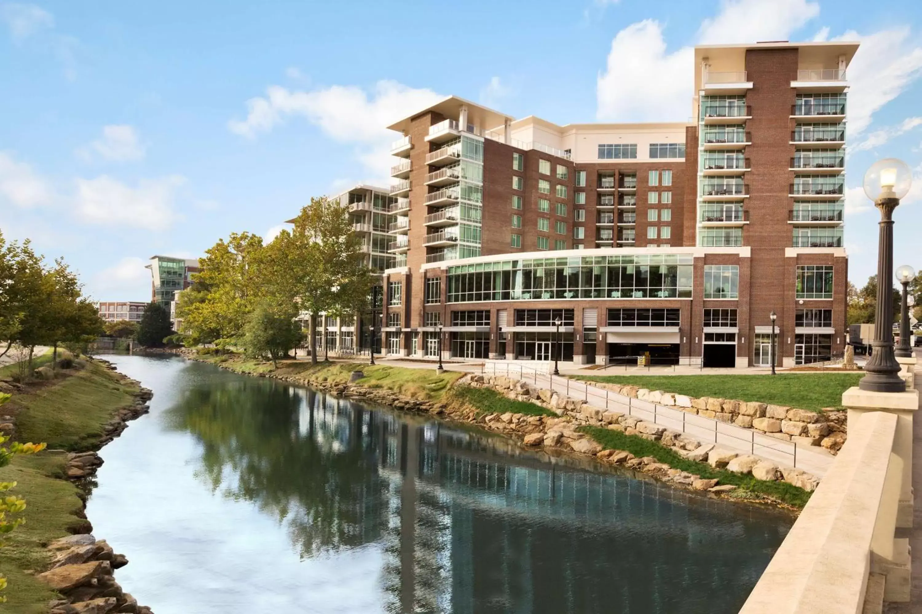 Property building, Swimming Pool in Embassy Suites by Hilton Greenville Downtown Riverplace
