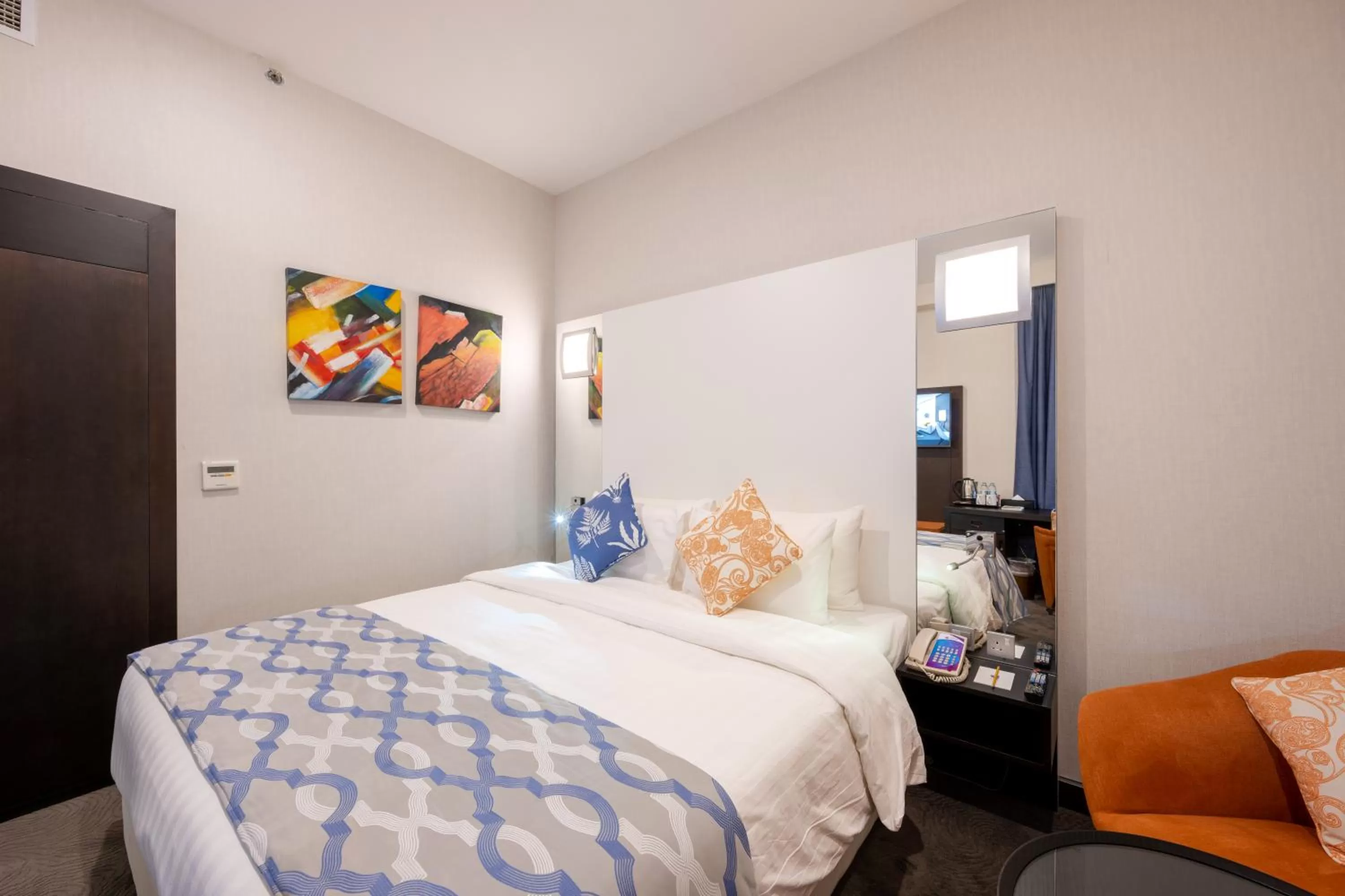 Photo of the whole room, Bed in Ramada Encore Doha by Wyndham