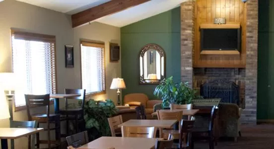 Lobby or reception in AmericInn by Wyndham West Bend