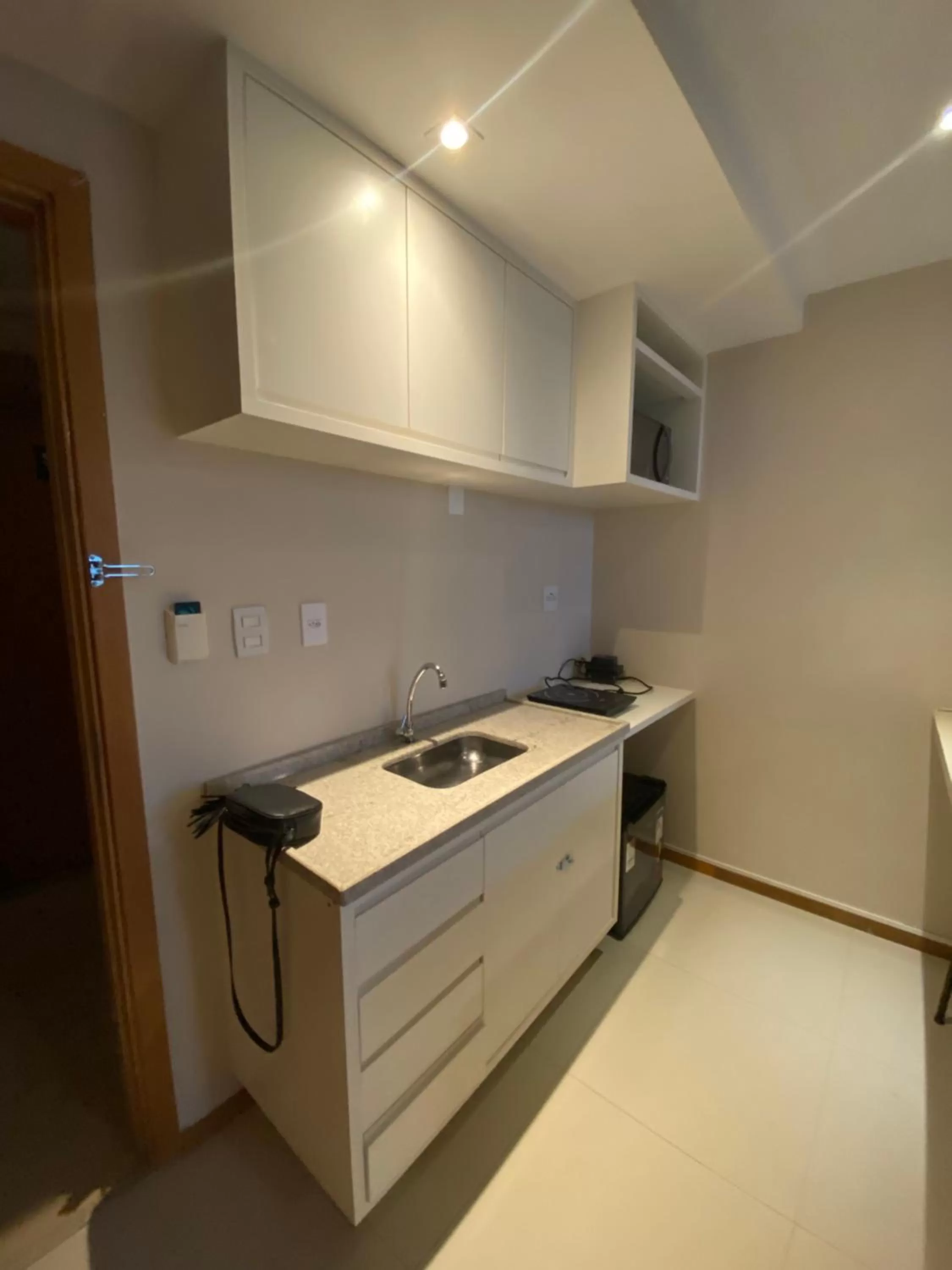 Kitchen/Kitchenette in Flat em Ed Jade hotel