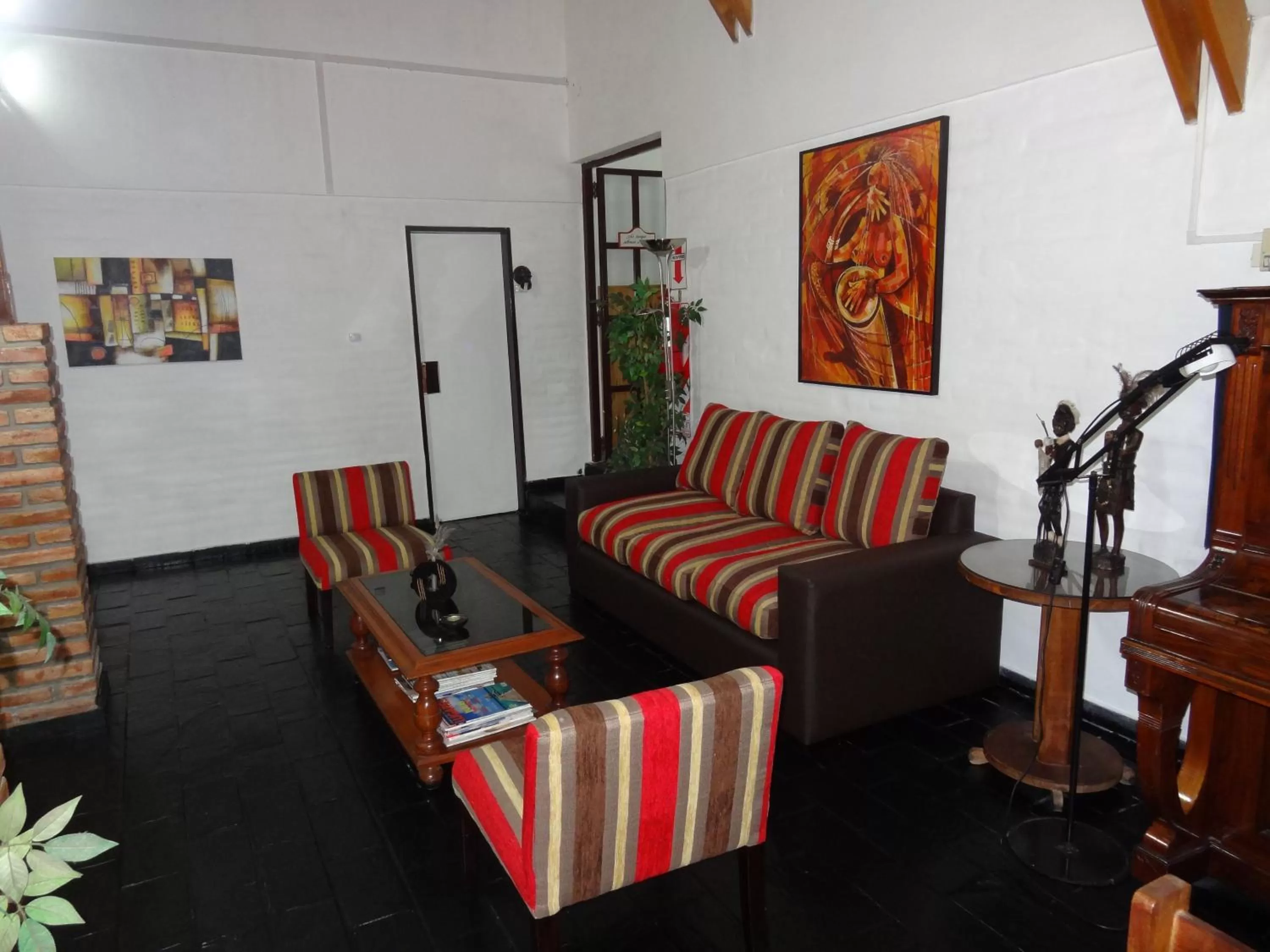 Communal lounge/ TV room in Hostería Lida