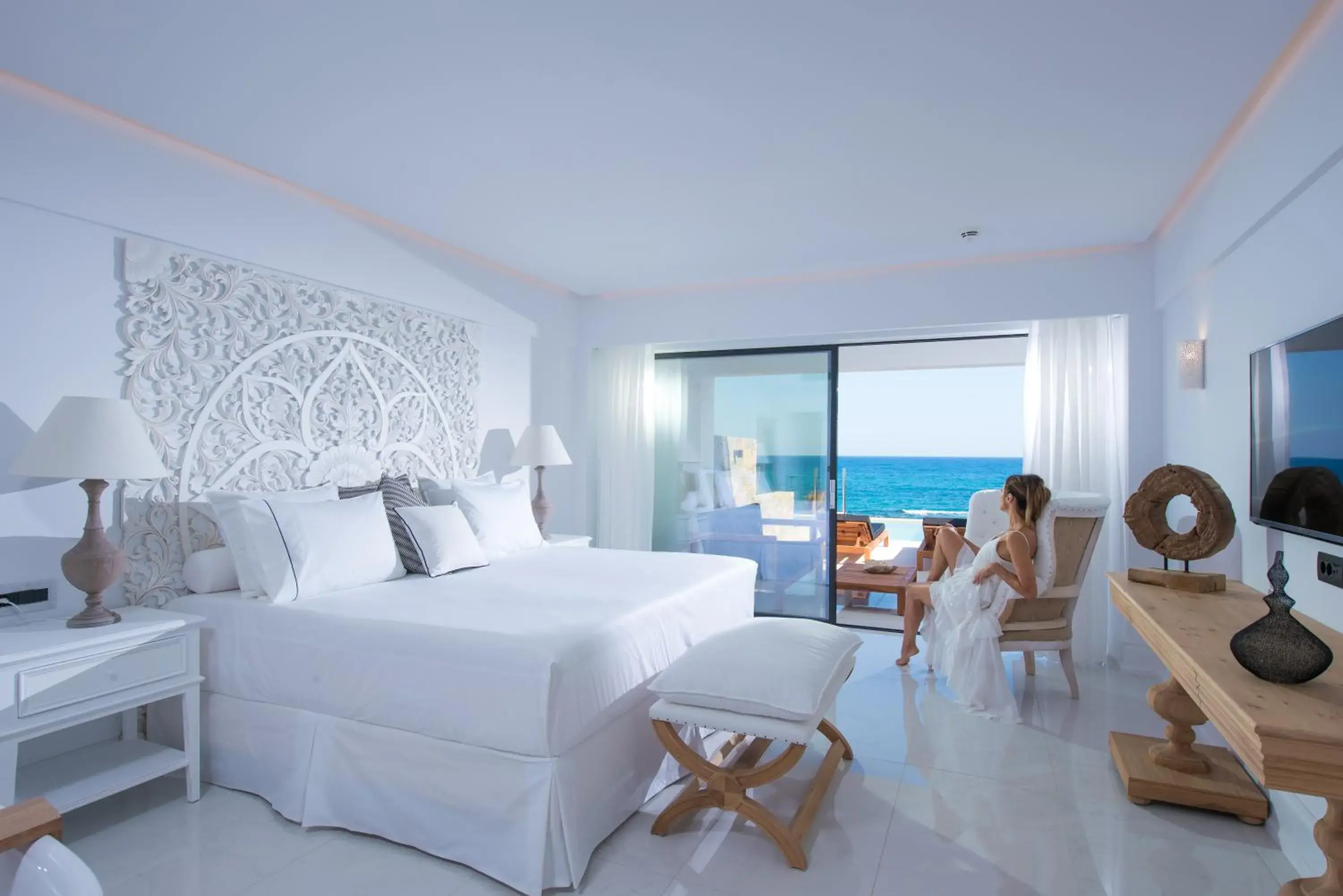 Bed in Abaton Island Resort & Spa
