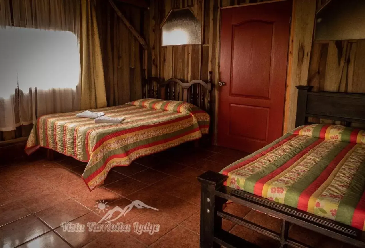 Bed in Vista Turrialba Lodge
