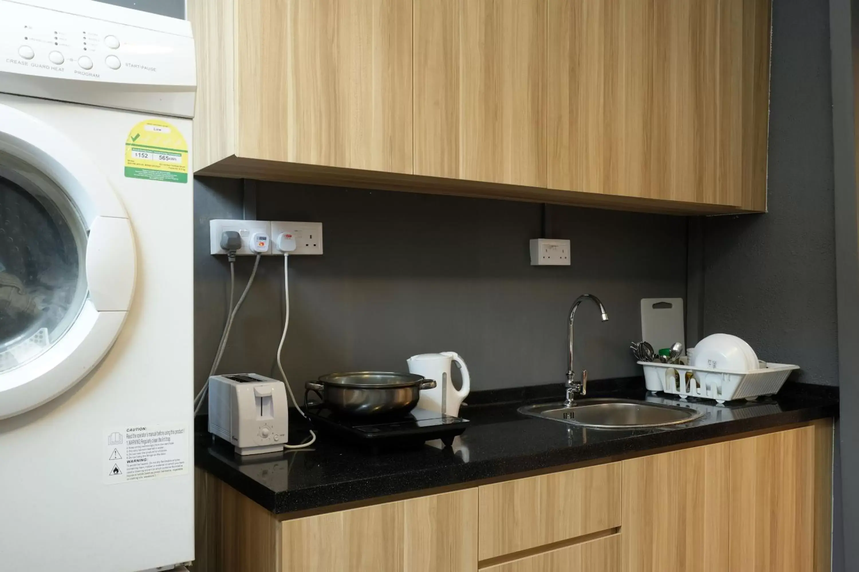 Coffee/tea facilities, Kitchen/Kitchenette in Q Loft Hotels at Bedok