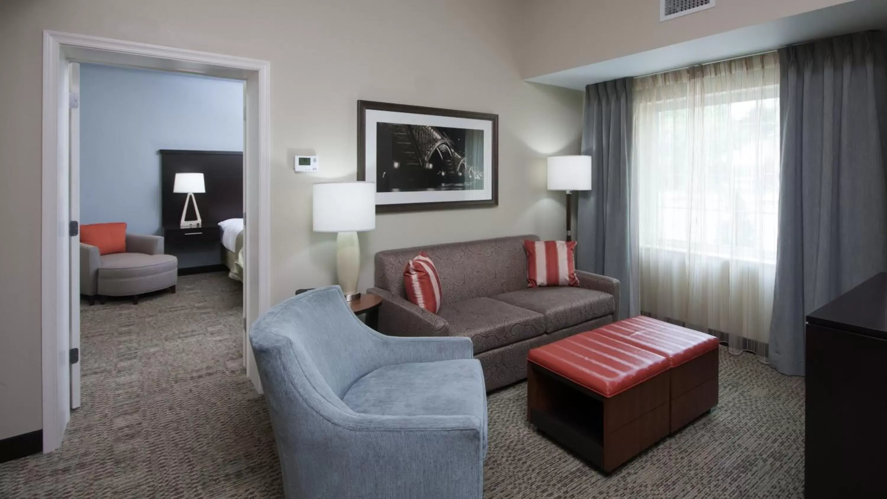 Photo of the whole room, Seating Area in Staybridge Suites Buffalo-Amherst, an IHG Hotel