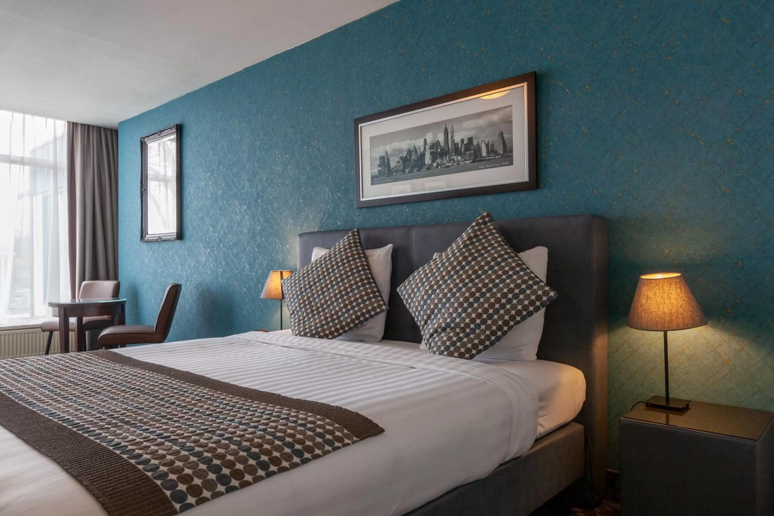 Seating area, Bed in Amsterdam Hotel Uithoorn