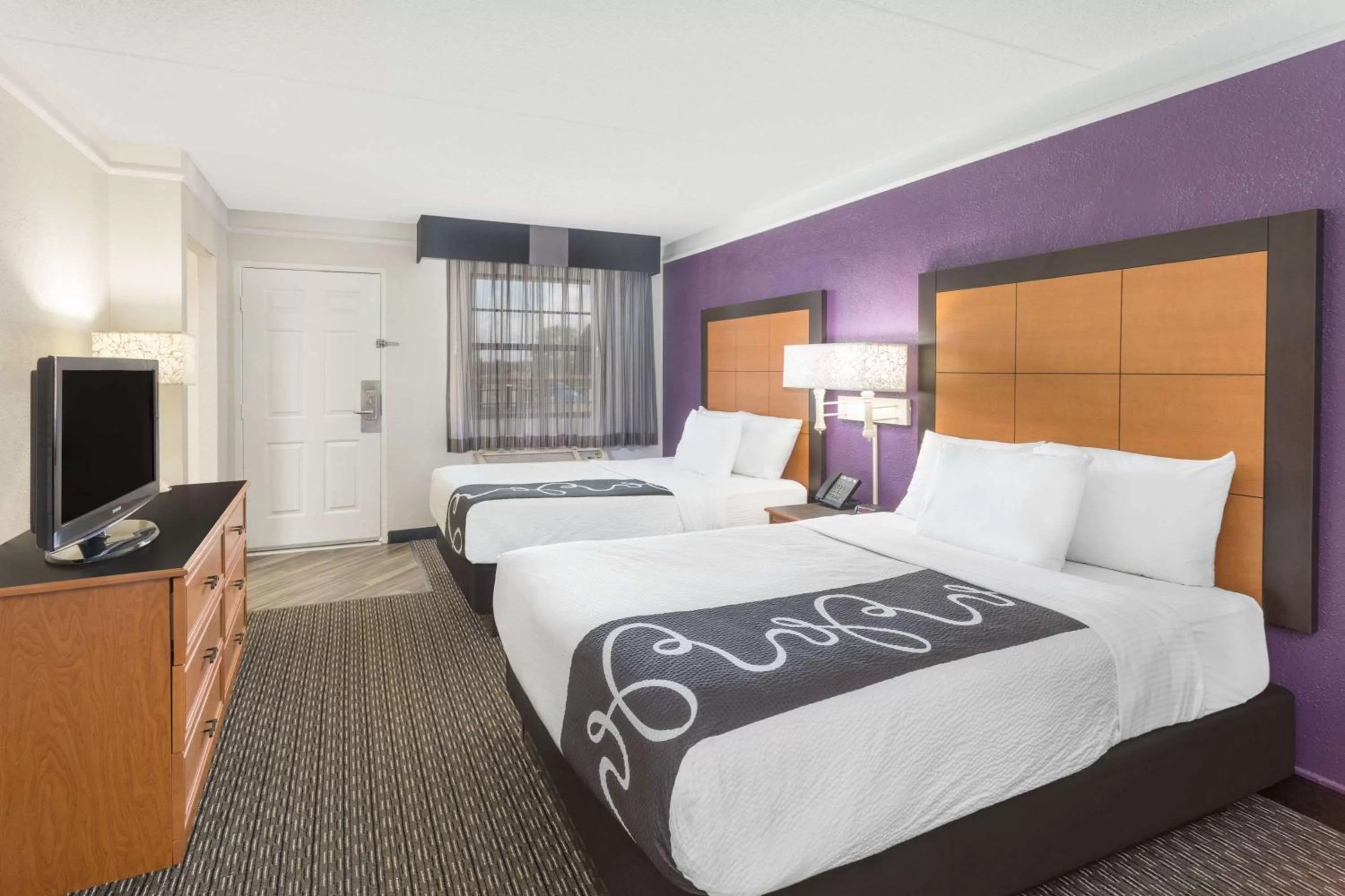 Photo of the whole room, Bed in Baymont by Wyndham Greenville Woodruff Rd