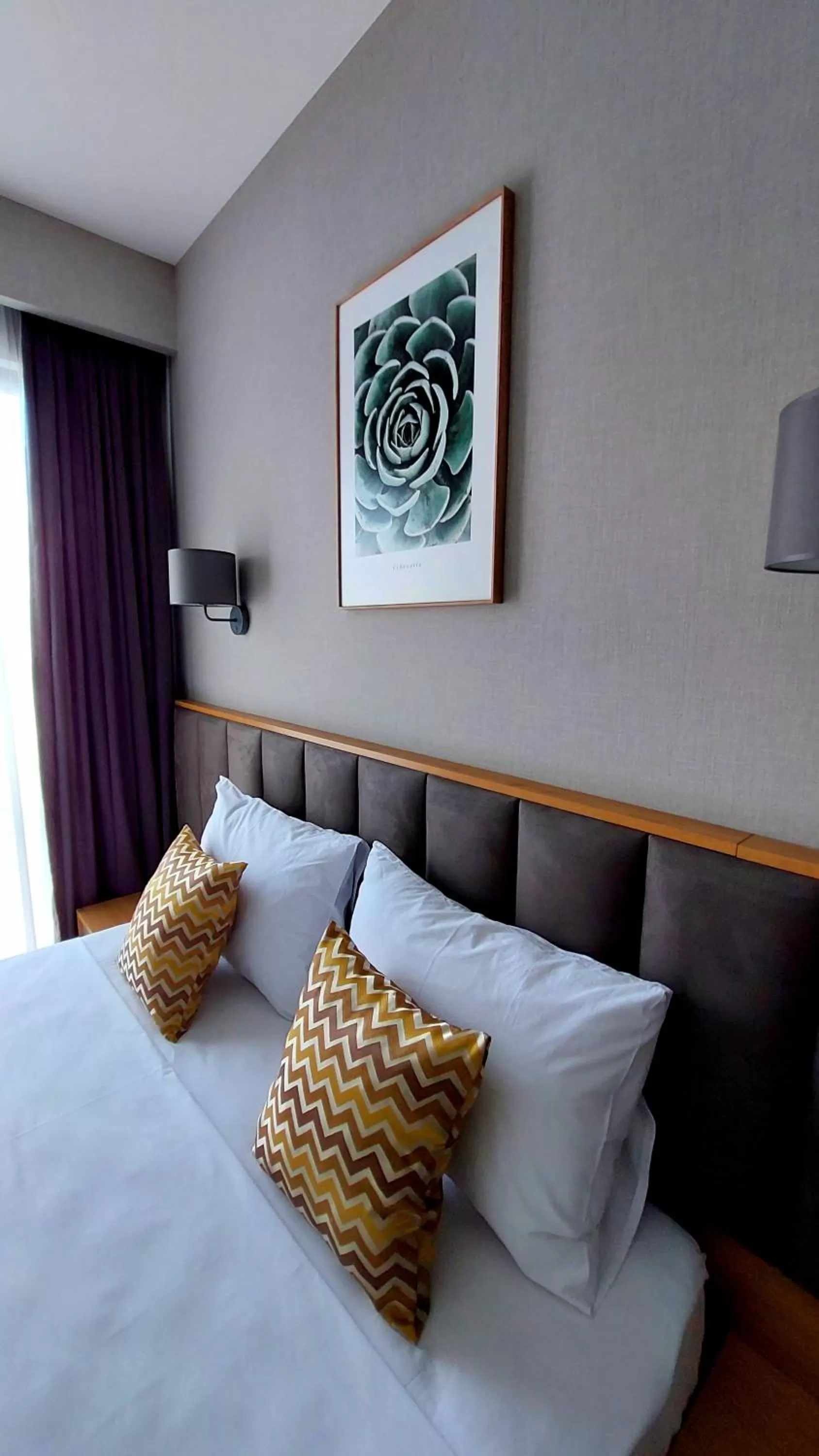 Bed in Falcon Boutique Hotel