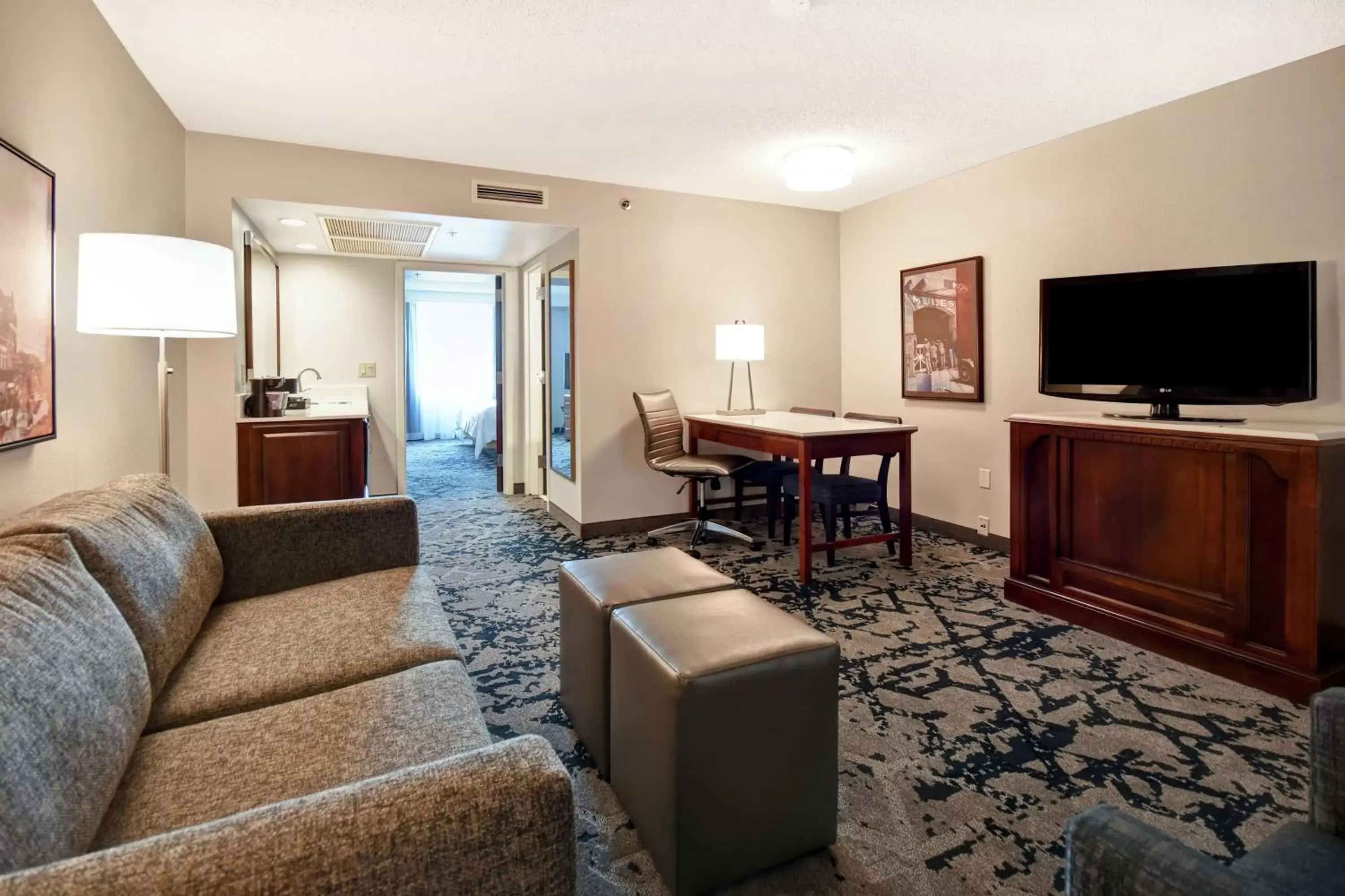 Bedroom, Seating Area in Embassy Suites Montgomery - Hotel & Conference Center