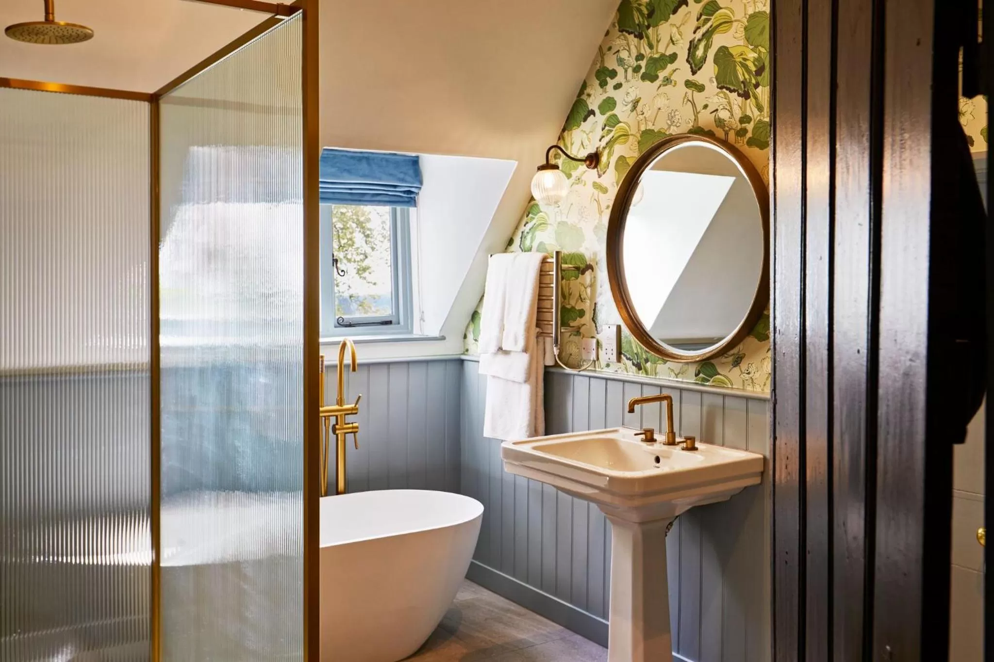 Bathroom in Ockenden Manor Hotel & Spa