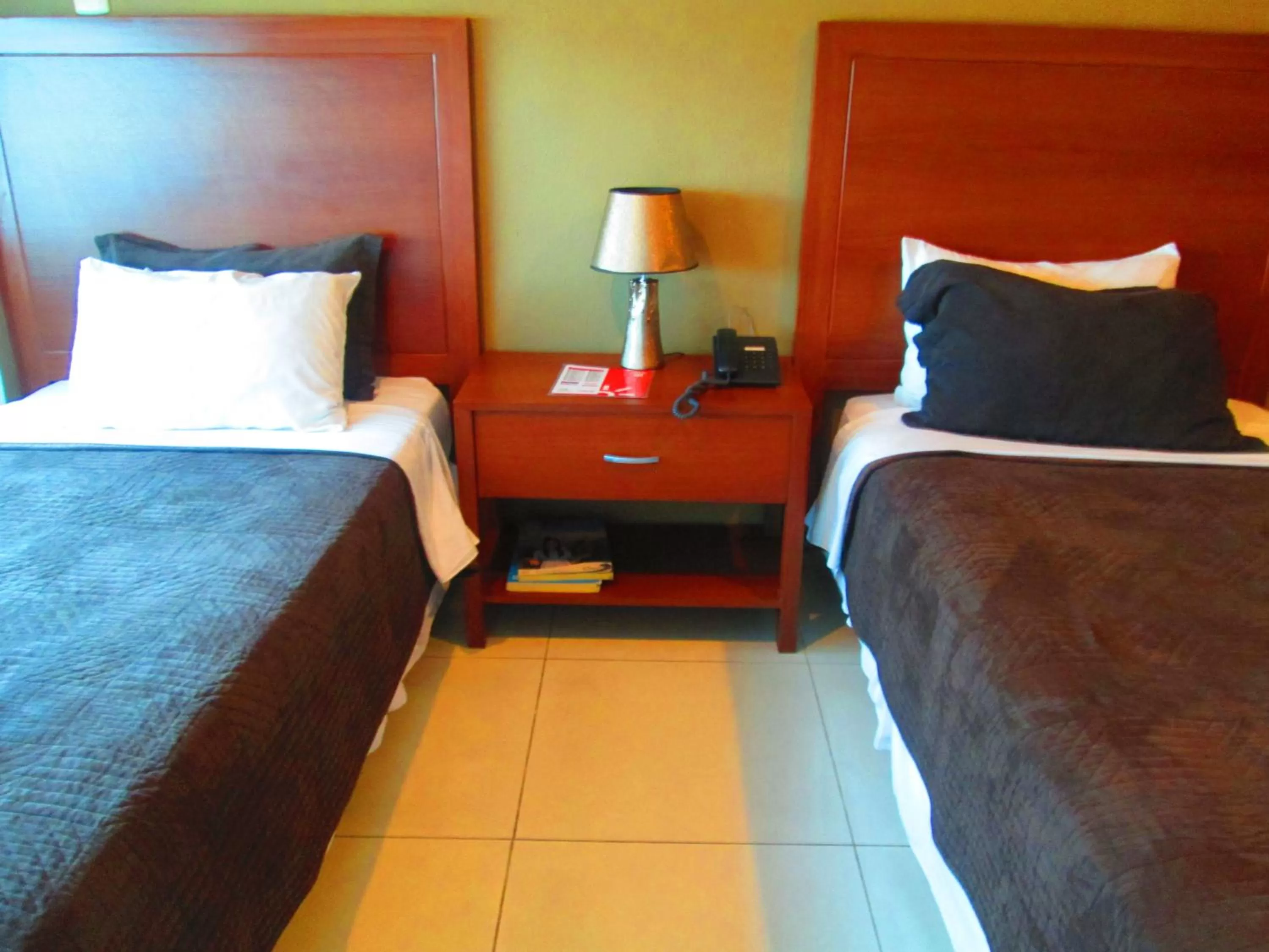 Bedroom, Bed in Hotel Garzota Inn