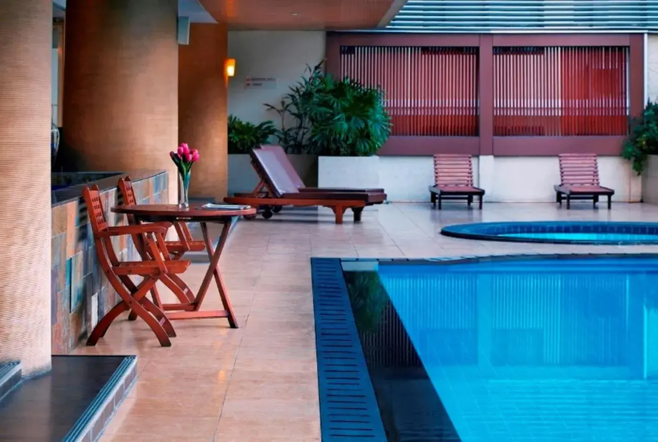 Seating area, Swimming Pool in Sm Grande Residence