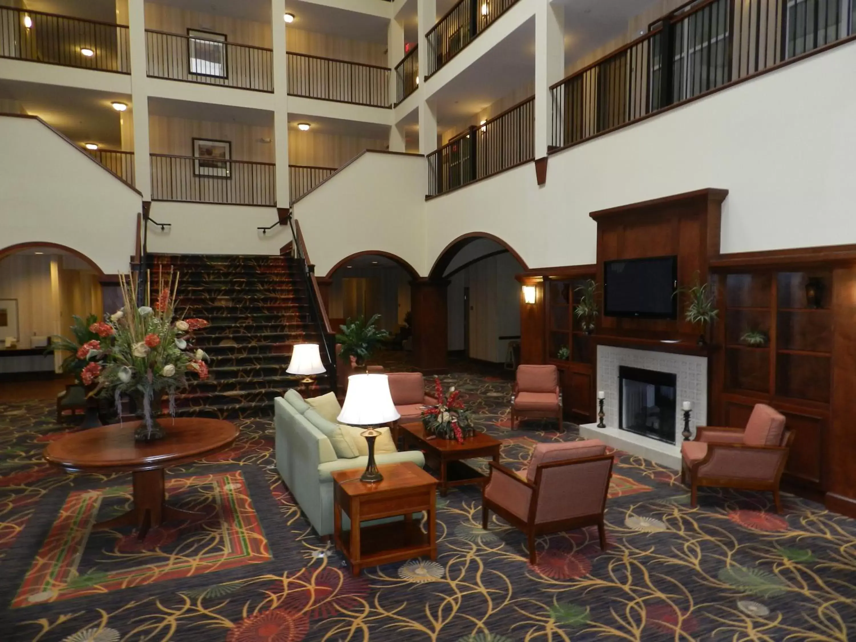 Communal lounge/ TV room, Seating Area in Country Inn & Suites by Radisson, Braselton, GA