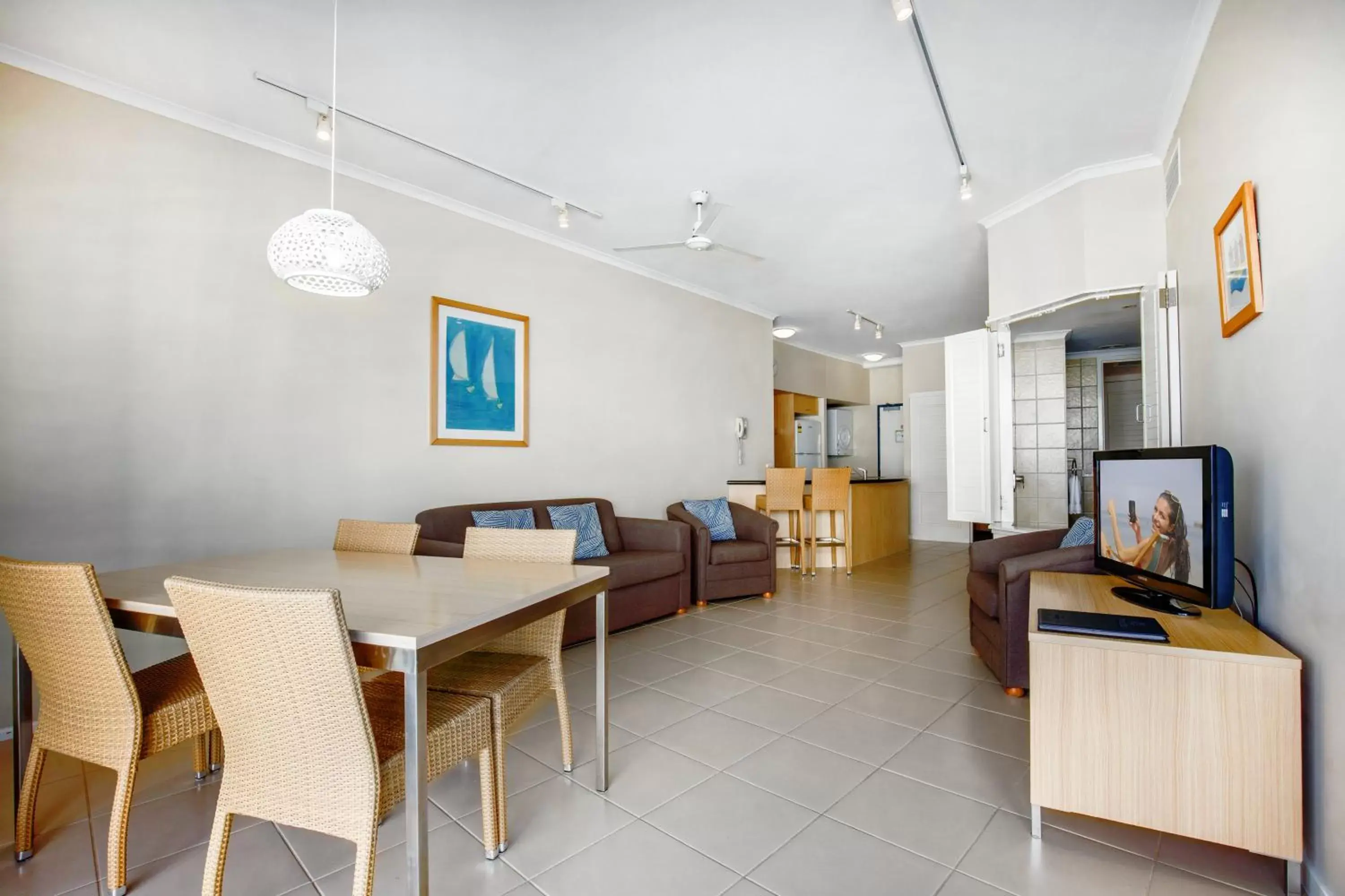 Living room, Dining Area in Rolling Surf Resort