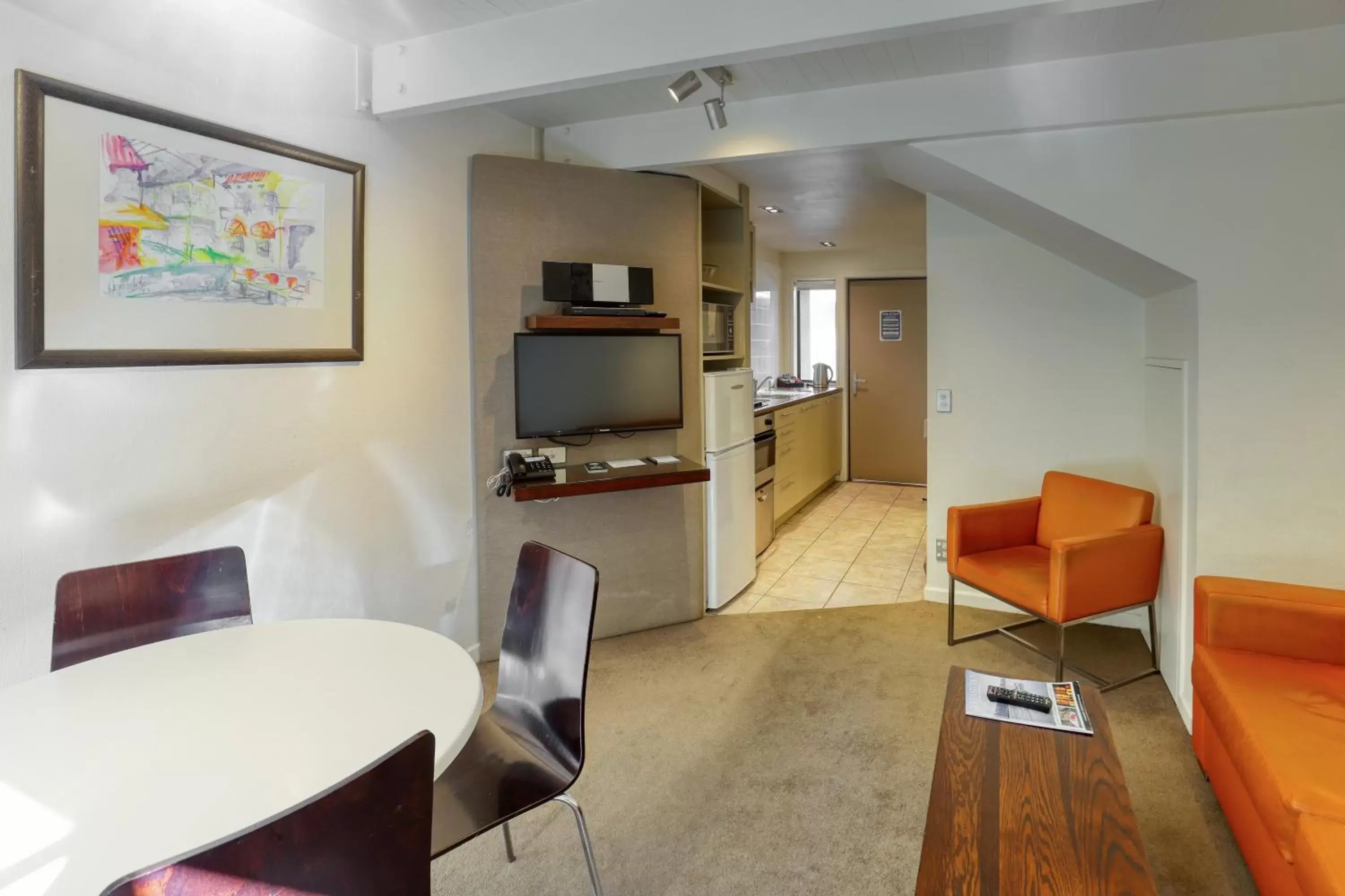 Bedroom, Seating Area in Garden Court Suites & Apartments