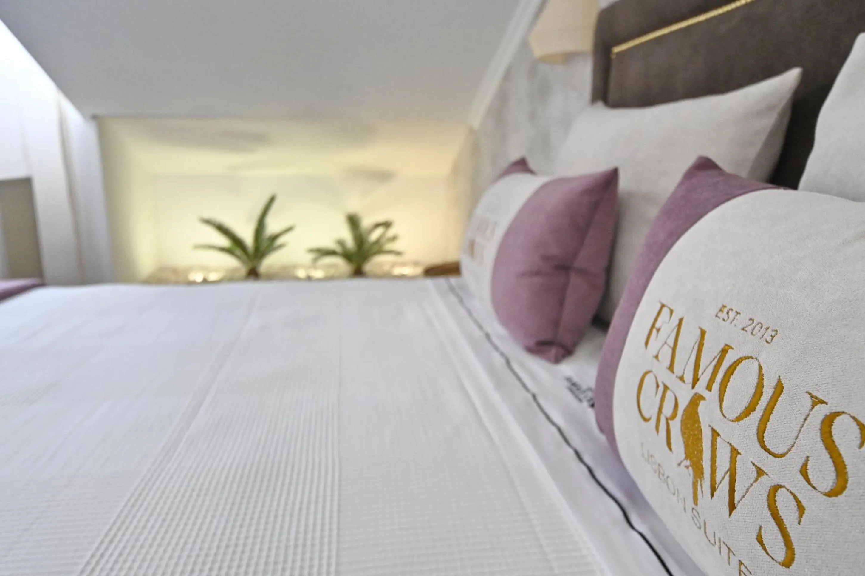 Bed in Famous Crows Lisbon Suites