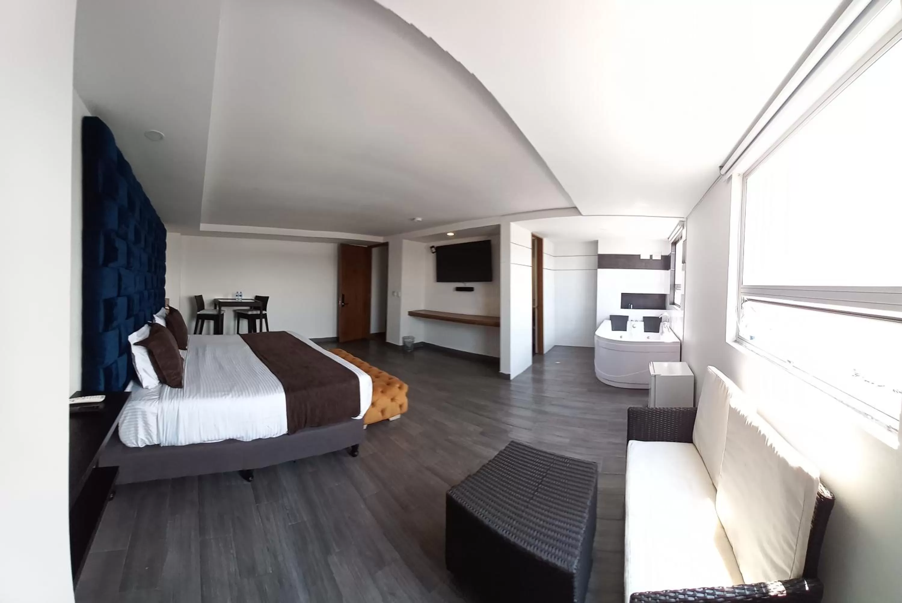 Living room, Bed in Hotel Bogota DC