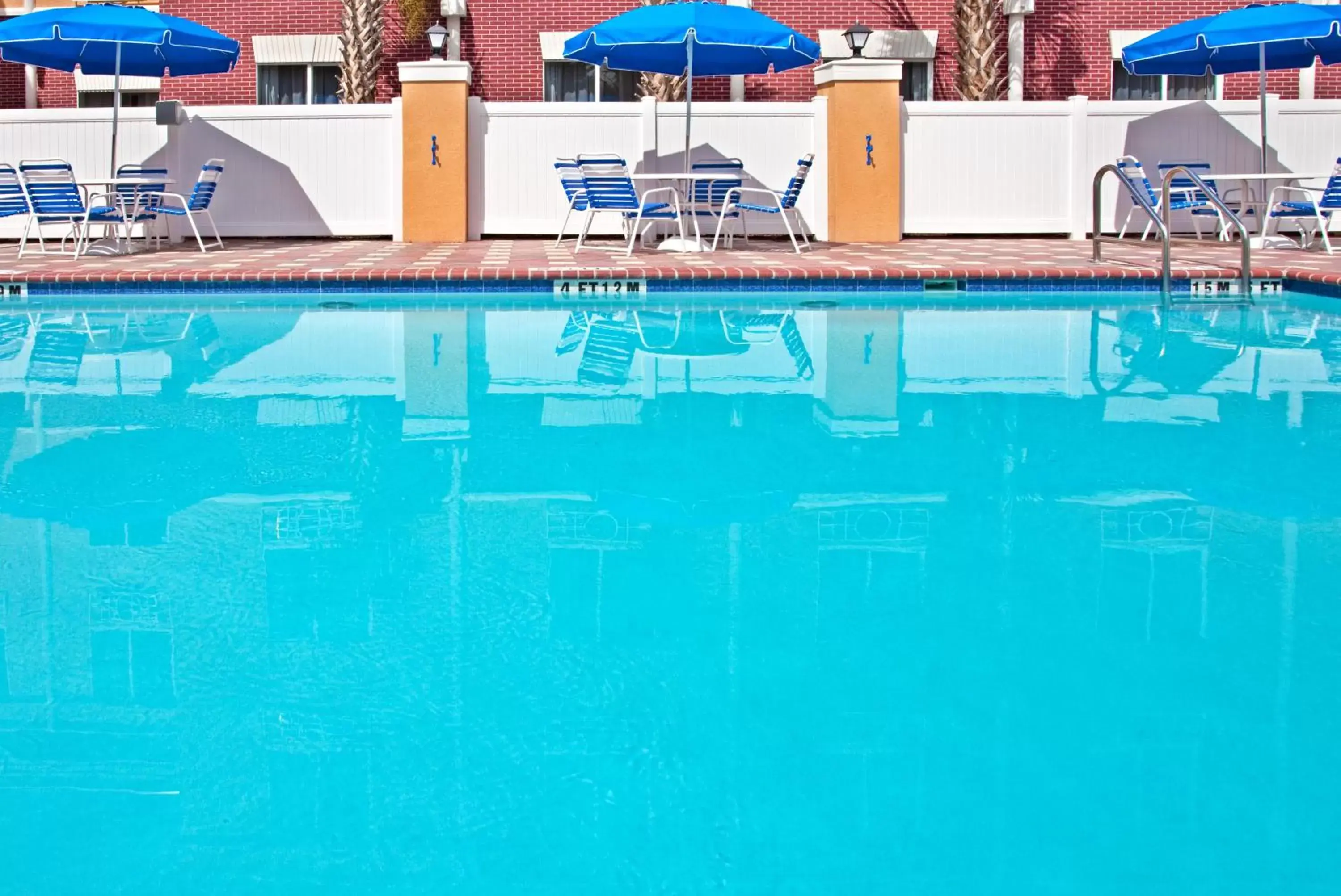 Swimming Pool in Holiday Inn Express Hotel & Suites Brooksville-I-75, an IHG Hotel