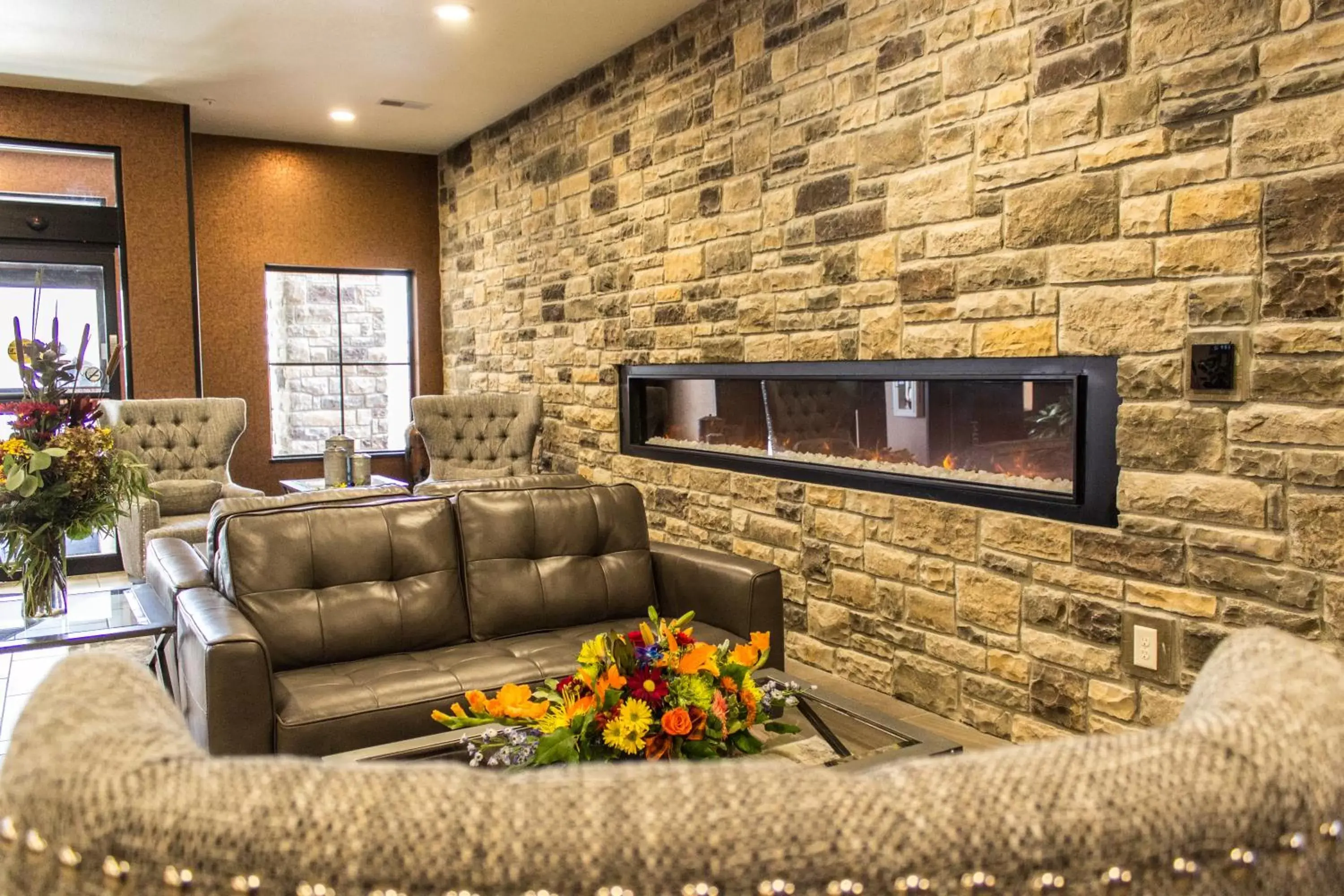 Lobby or reception, Seating Area in Cobblestone Hotel & Suites - Chippewa Falls