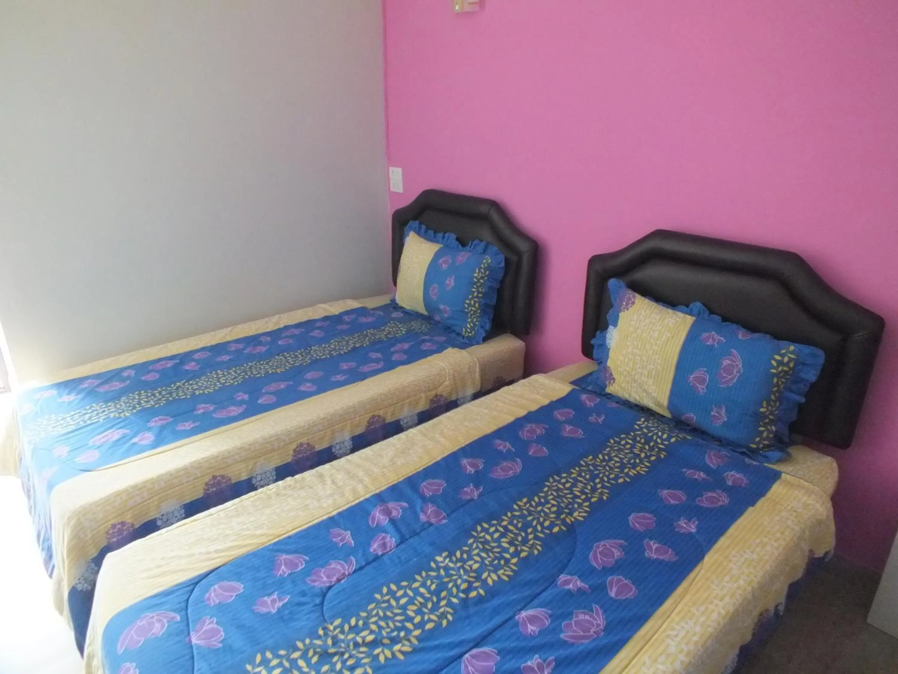 Bed in Vanlisut Hotel Ngamwongwan