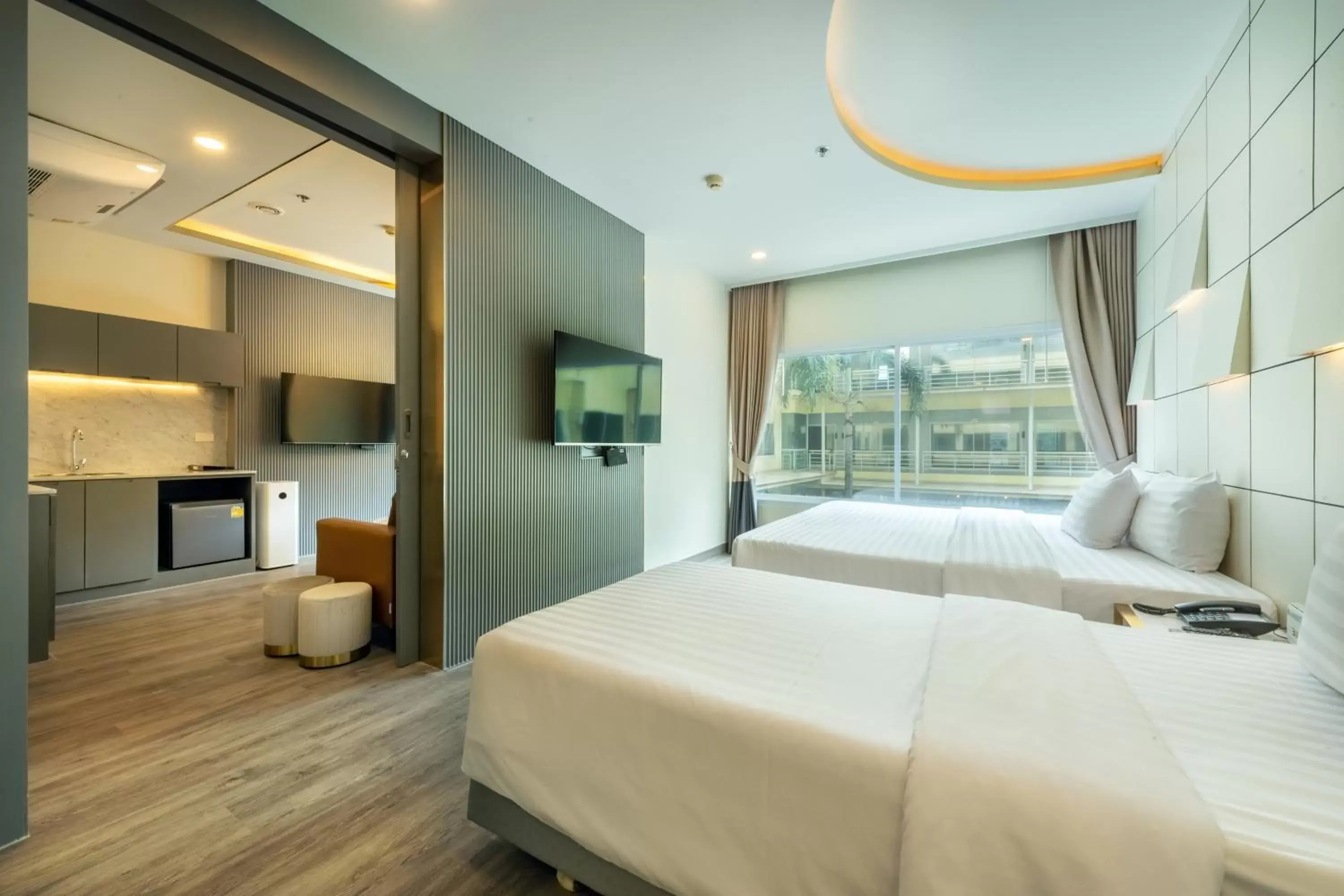 Bed in Qiu Hotel Sukhumvit SHA Plus