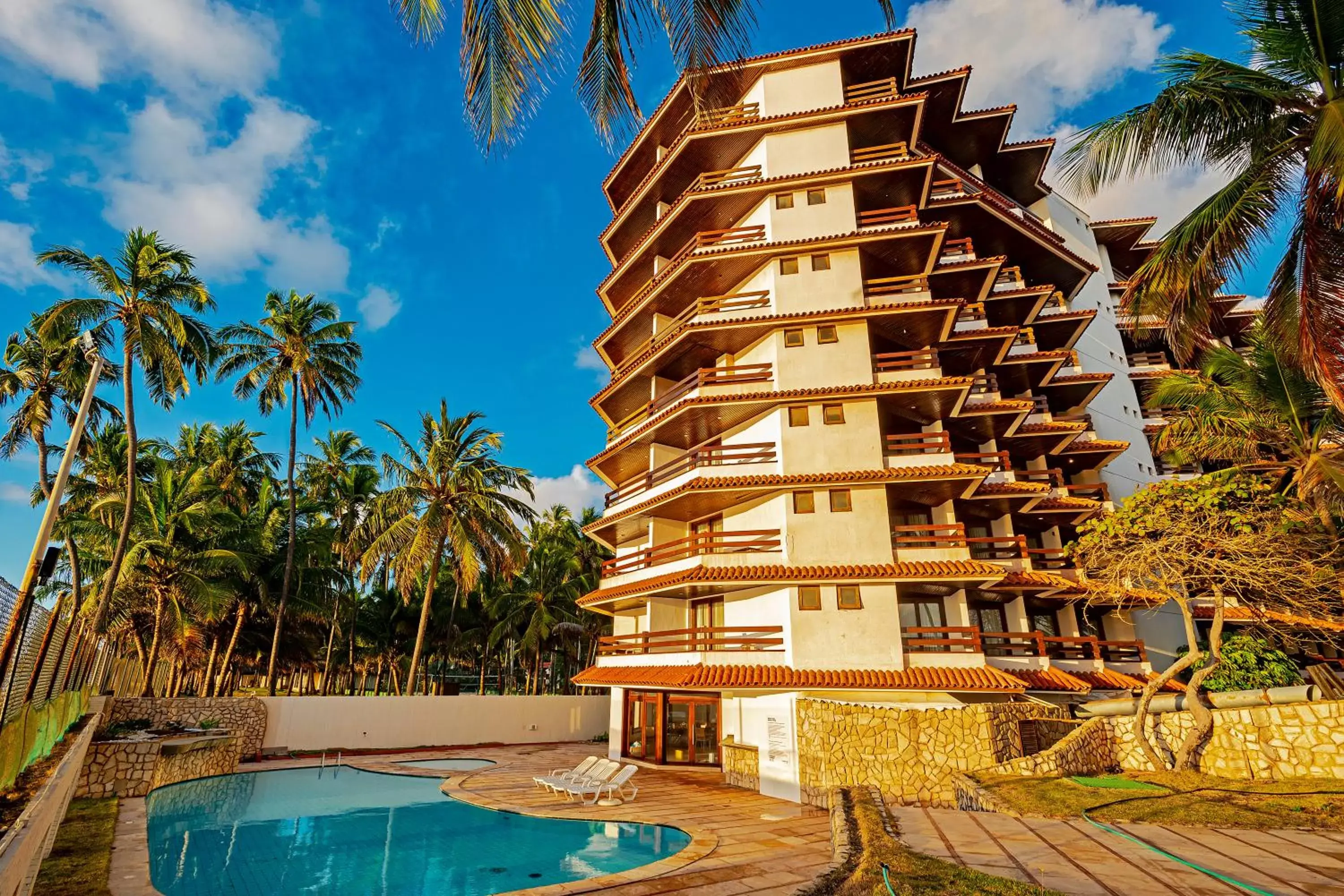 Property building, Swimming Pool in Jatiúca Suites Resort by Slaviero Hotéis