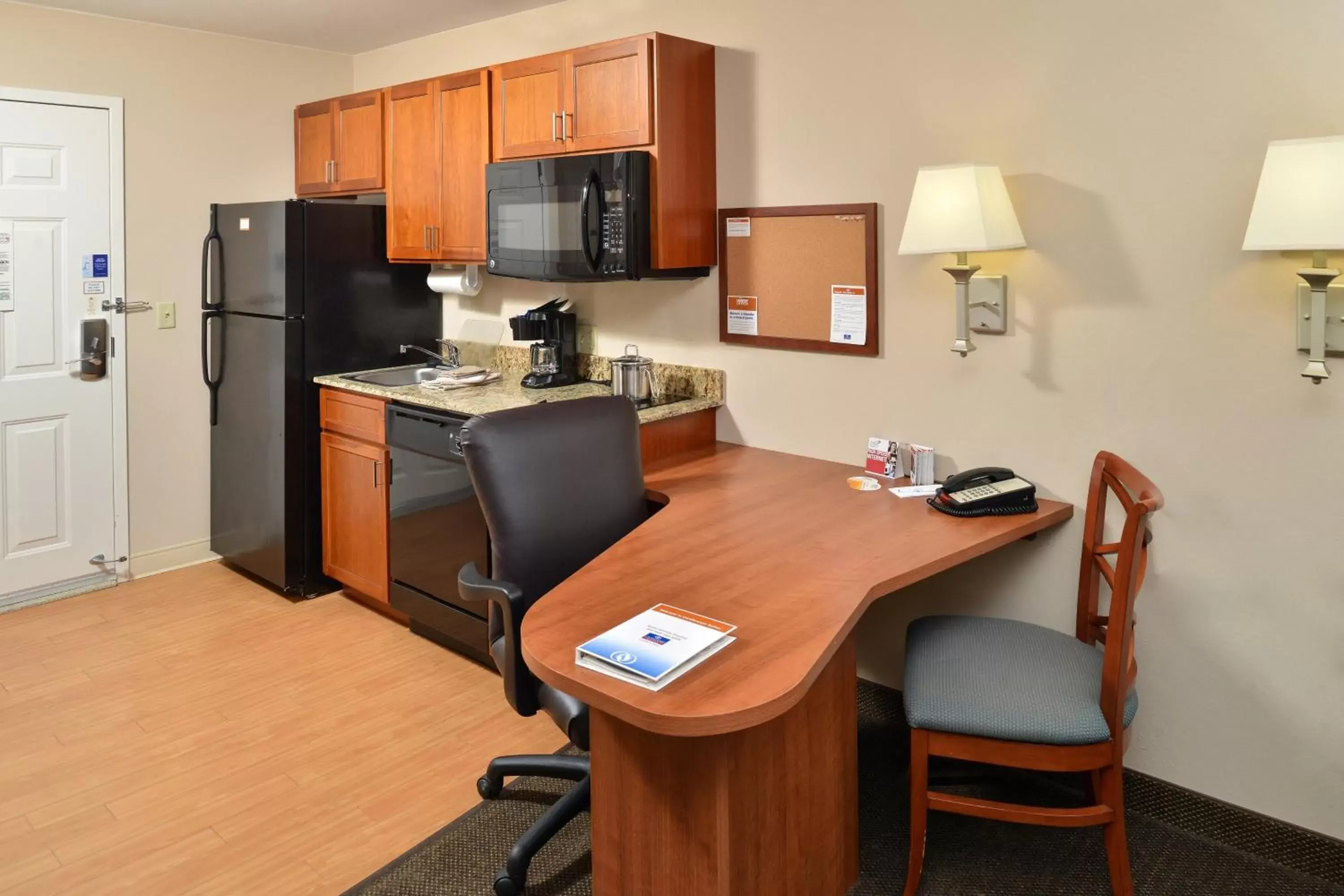 Photo of the whole room, Kitchen/Kitchenette in Candlewood Suites Chambersburg, an IHG Hotel