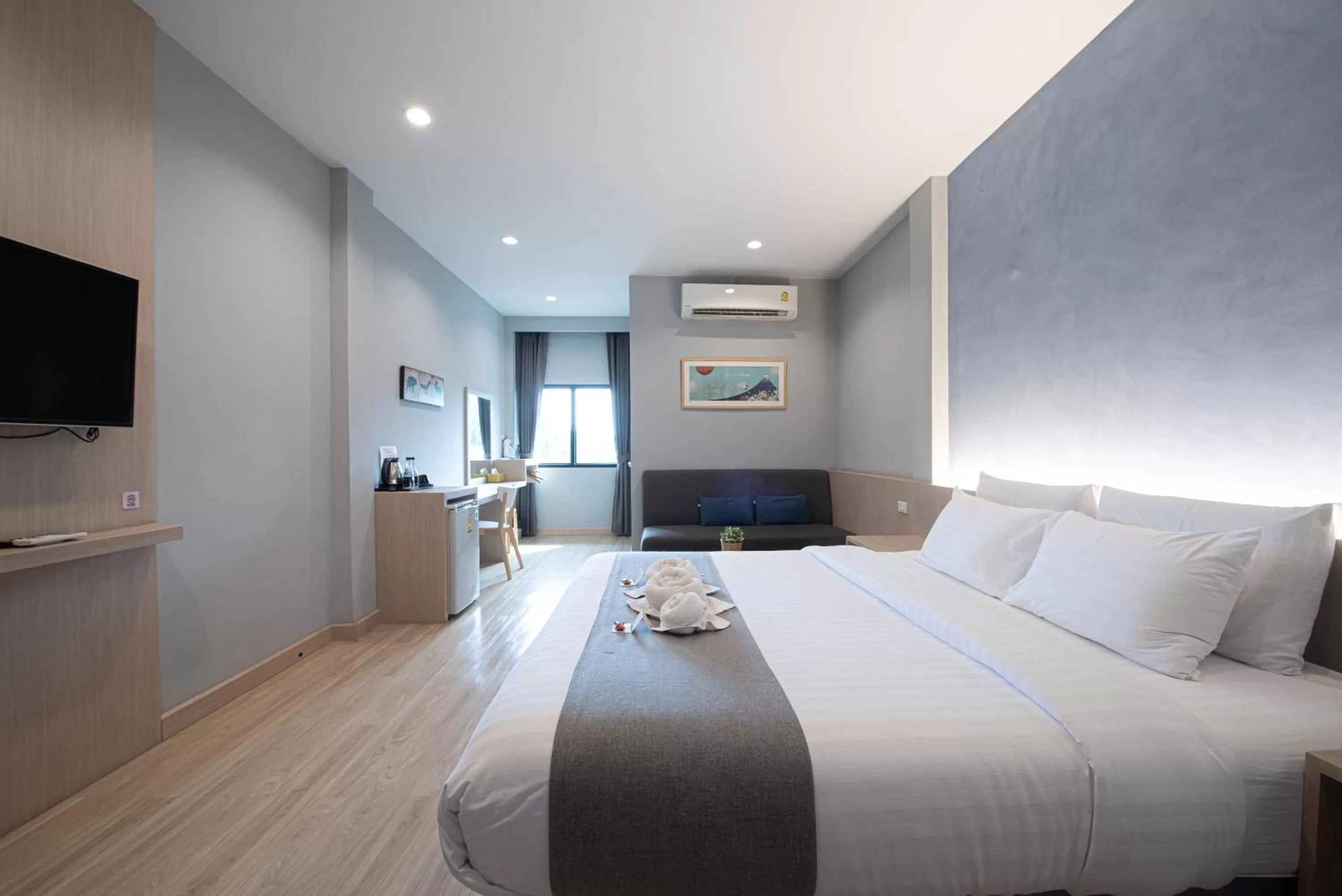 Bed in Tarnsiri Boutique Resort