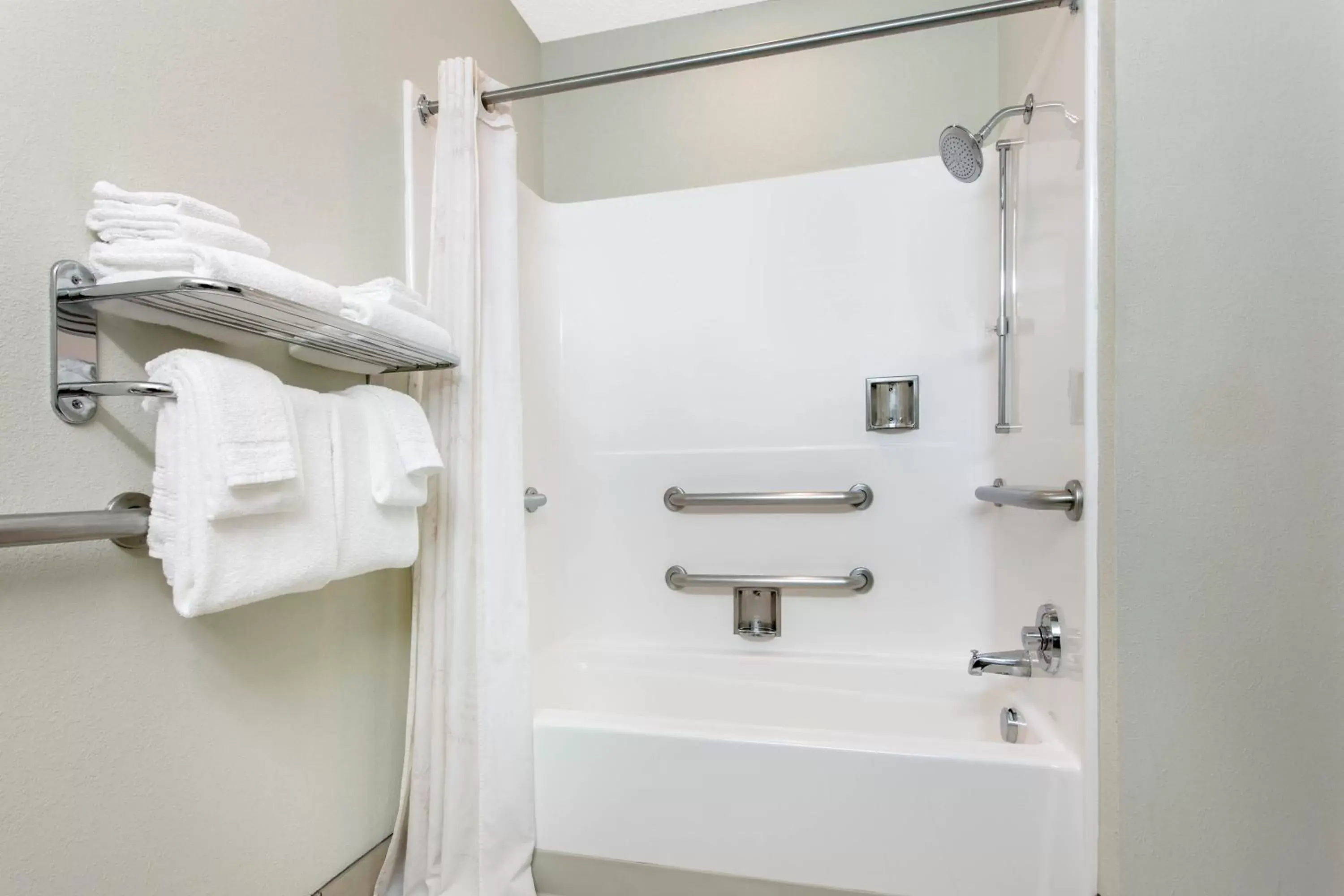 Bathroom in Microtel Inn & Suites by Wyndham Lillington/Campbell University