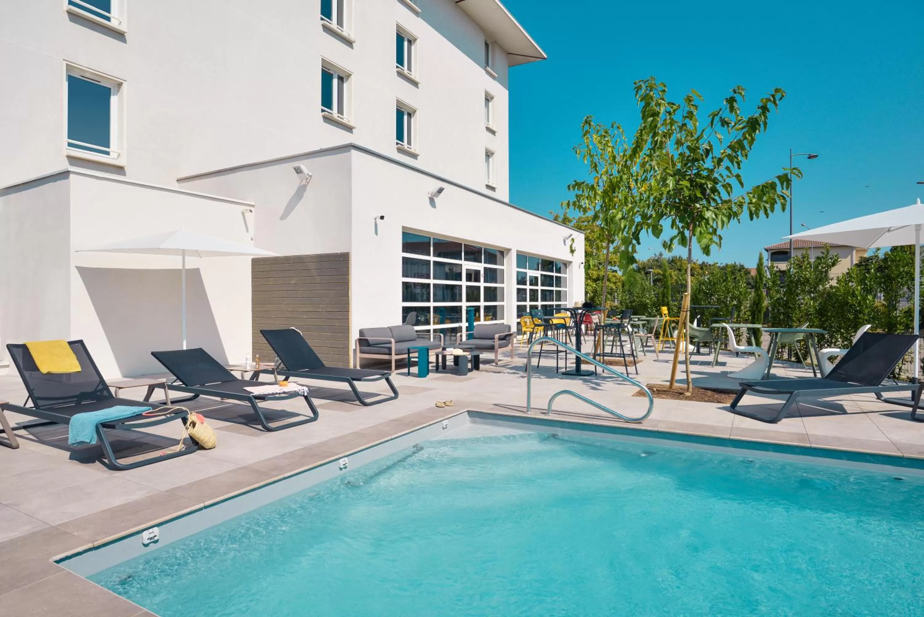 Swimming pool in ibis Styles Lyon Meyzieu Arena Stadium