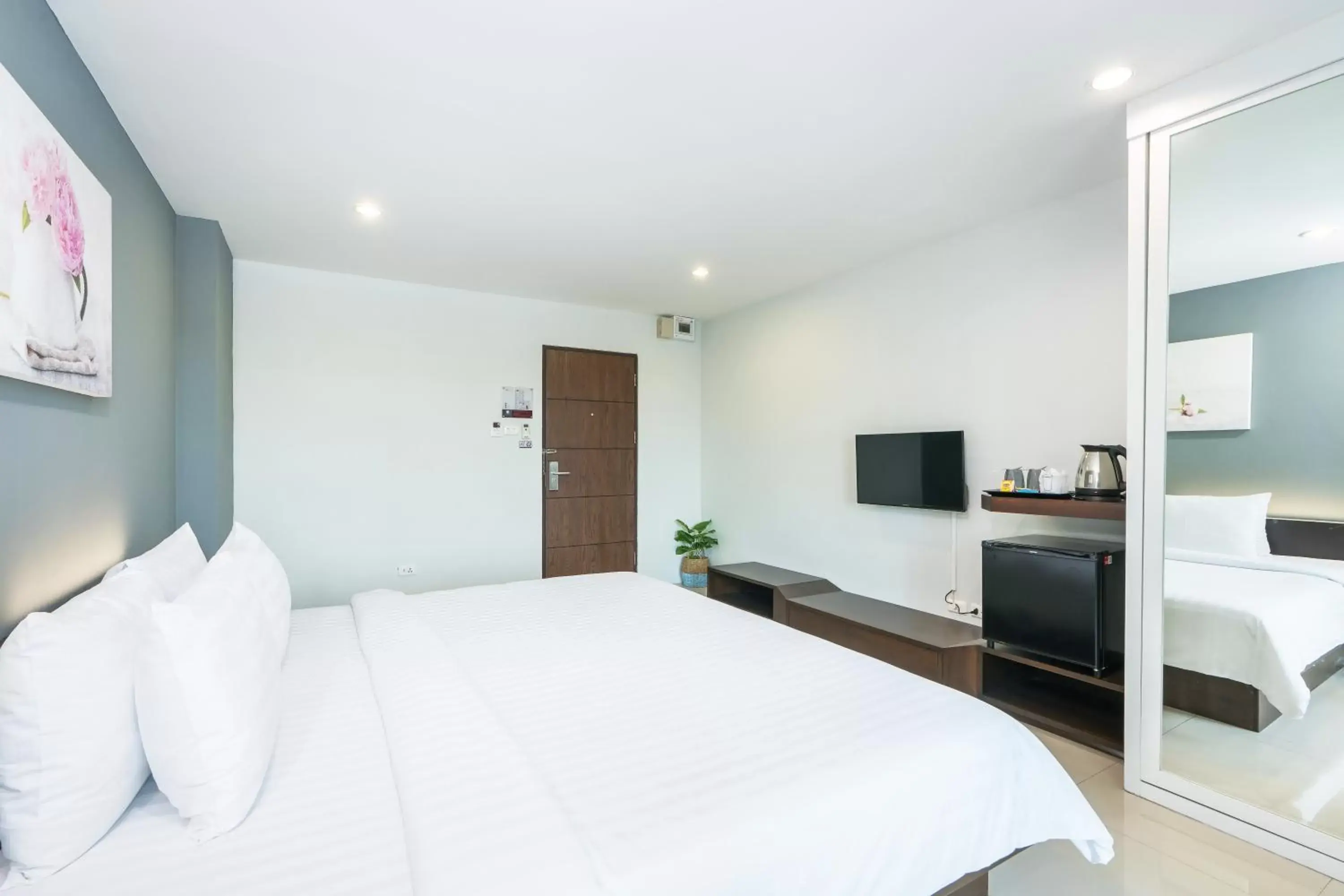 Bed in De Botan Srinakarin Hotel & Residence